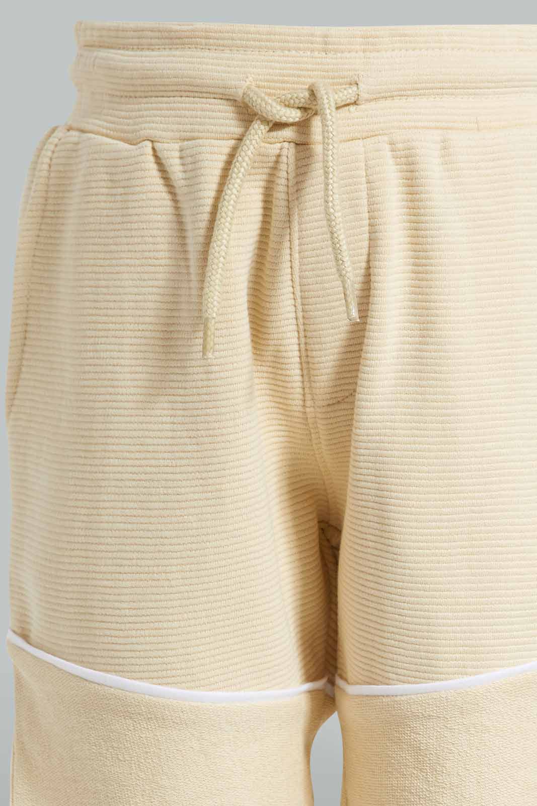 Redtag-Stone-Paneled-Ripple-Terry-Short-BOY-Active-Shorts,-Category:Shorts,-Colour:Beige,-Deals:New-In,-Filter:Boys-(2-to-8-Yrs),-New-In-BOY-APL,-Non-Sale,-S22C,-Section:Kidswear-Boys-2 to 8 Years