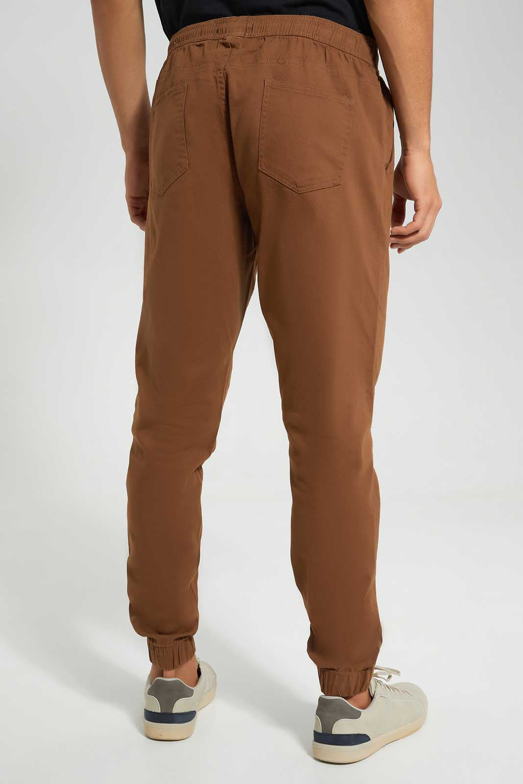 Redtag-Tan-Brown-Slim-Fit-Jogger-Category:Trousers,-Colour:Tan,-Deals:New-In,-Filter:Men's-Clothing,-Men-Trousers,-New-In-Men-APL,-Non-Sale,-S22C,-Section:Men,-TBL-Men's-