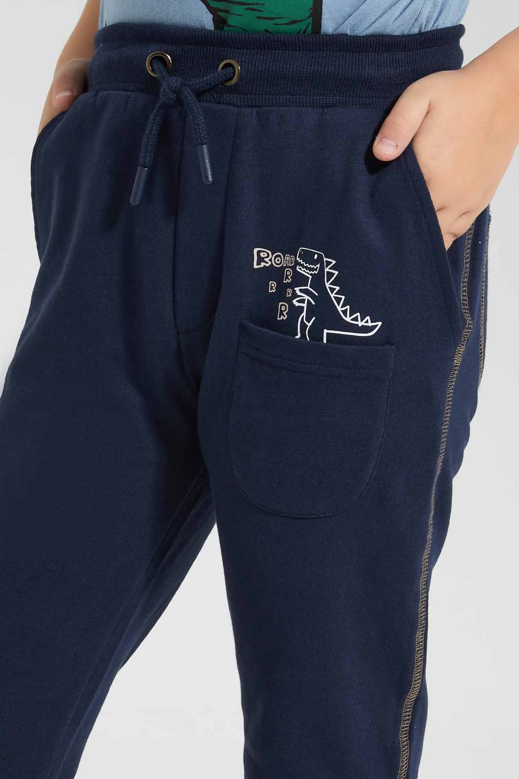 Redtag-Navy-Dino-Pocket-Print-Jog-Pant-BOY-Joggers,-Category:Joggers,-Colour:Navy,-Deals:New-In,-Filter:Boys-(2-to-8-Yrs),-New-In-BOY-APL,-Non-Sale,-Section:Boys-(0-to-14Yrs),-W22O-Boys-2 to 8 Years