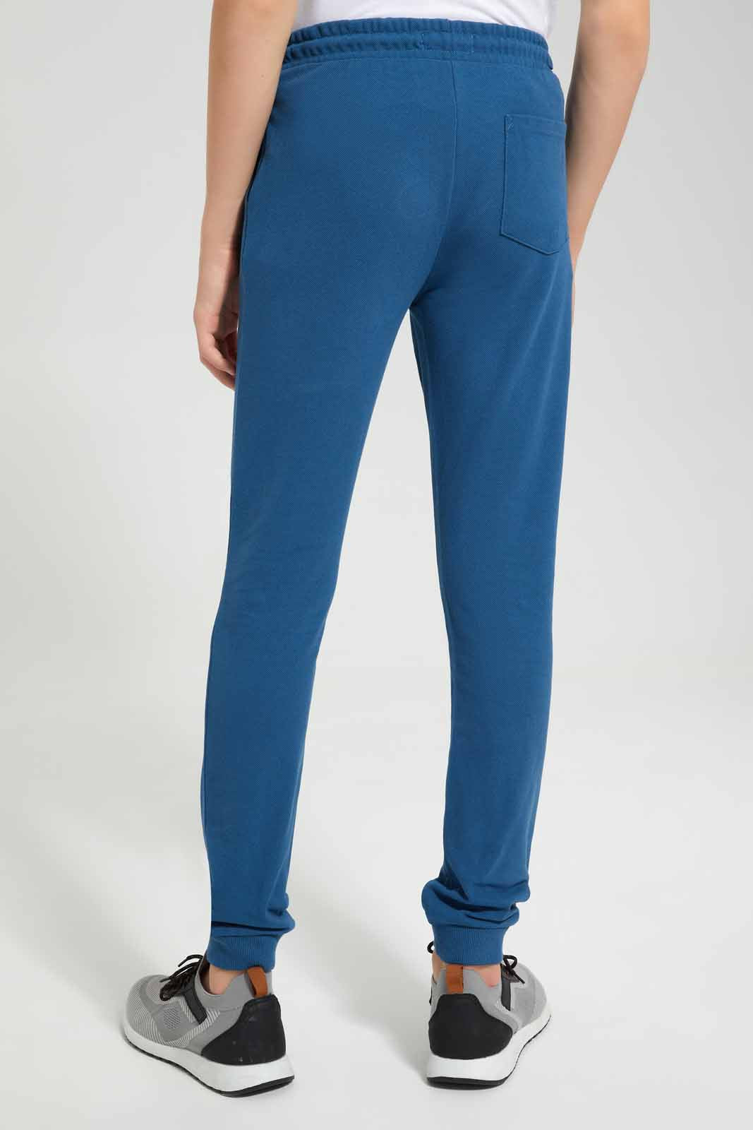 Redtag-Blue-Pique-Active-Pant-BSR-Joggers,-Category:Joggers,-Colour:Blue,-Deals:New-In,-Filter:Senior-Boys-(9-to-14-Yrs),-New-In-BSR-APL,-Non-Sale,-Section:Boys-(0-to-14Yrs),-VLM,-W22O-Senior-Boys-9 to 14 Years