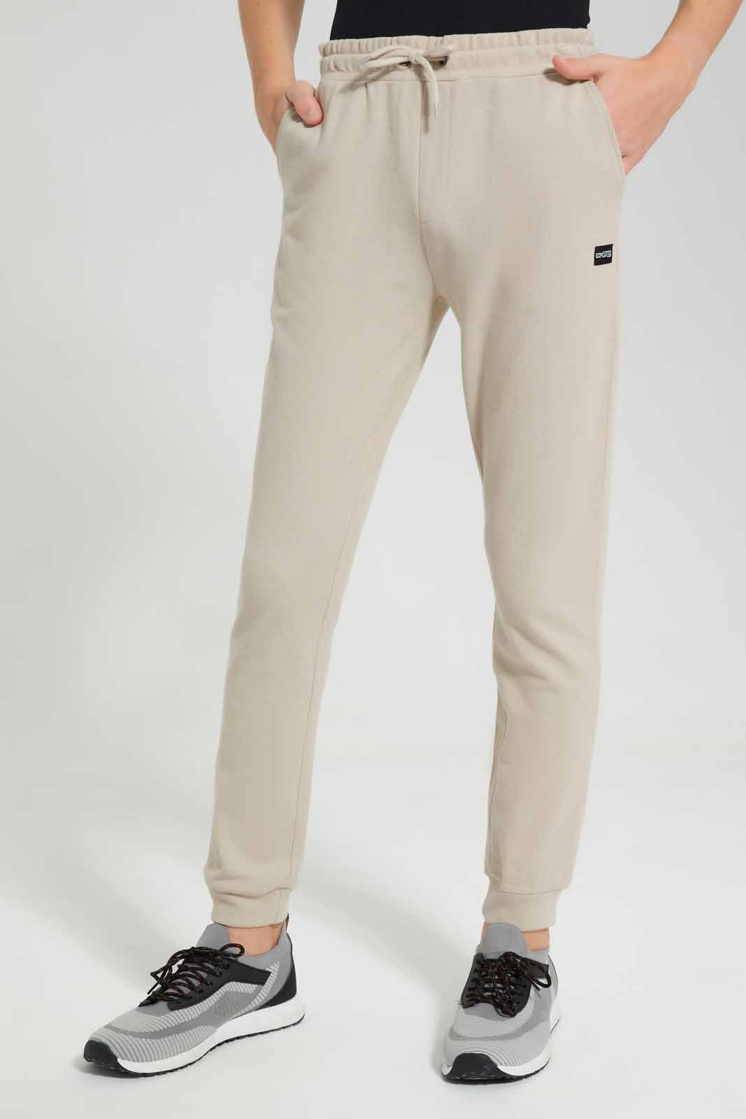 Redtag-Beige-Pique-Active-Pant-BSR-Joggers,-Category:Joggers,-Colour:Beige,-Deals:New-In,-Filter:Senior-Boys-(9-to-14-Yrs),-New-In-BSR-APL,-Non-Sale,-Section:Boys-(0-to-14Yrs),-VLM,-W22O-Senior-Boys-9 to 14 Years