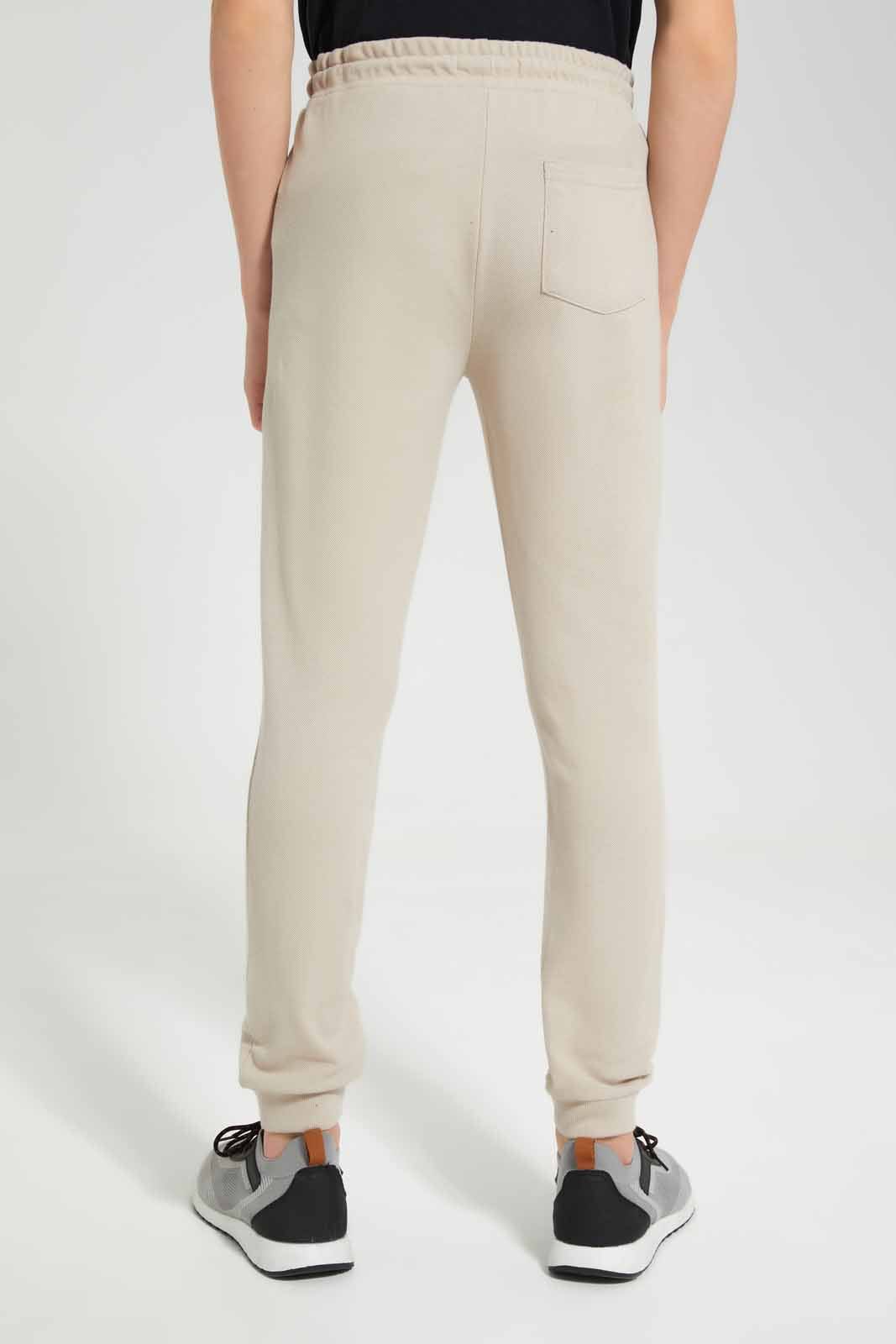 Redtag-Beige-Pique-Active-Pant-BSR-Joggers,-Category:Joggers,-Colour:Beige,-Deals:New-In,-Filter:Senior-Boys-(9-to-14-Yrs),-New-In-BSR-APL,-Non-Sale,-Section:Boys-(0-to-14Yrs),-VLM,-W22O-Senior-Boys-9 to 14 Years