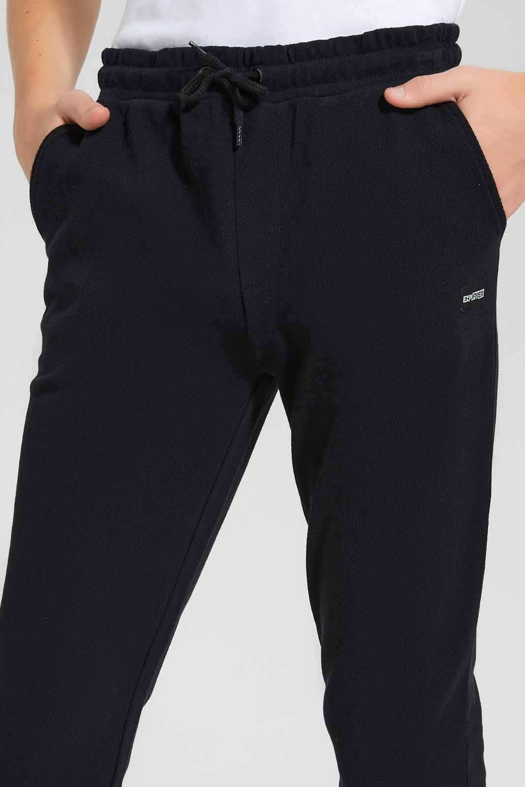 Redtag-Black-Pique-Active-Pant-BSR-Joggers,-Category:Joggers,-Colour:Black,-Deals:New-In,-Filter:Senior-Boys-(9-to-14-Yrs),-New-In-BSR-APL,-Non-Sale,-Section:Boys-(0-to-14Yrs),-VLM,-W22O-Senior-Boys-9 to 14 Years