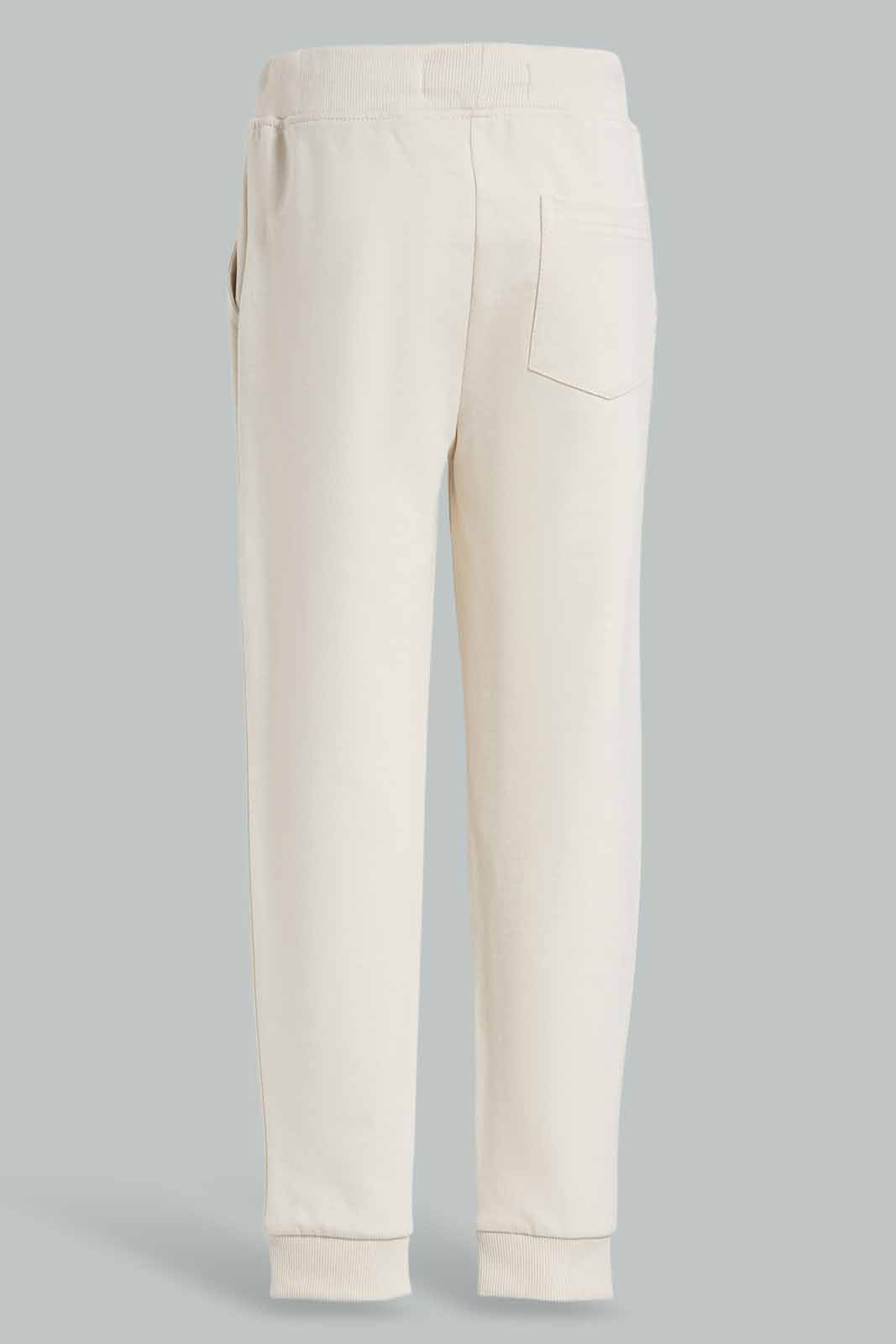 Redtag-Beige-Jogpant-With-Print-BOY-Joggers,-Category:Joggers,-Colour:Beige,-Deals:New-In,-Filter:Boys-(2-to-8-Yrs),-New-In-BOY-APL,-Non-Sale,-Section:Boys-(0-to-14Yrs),-TBL,-W22O-Boys-2 to 8 Years