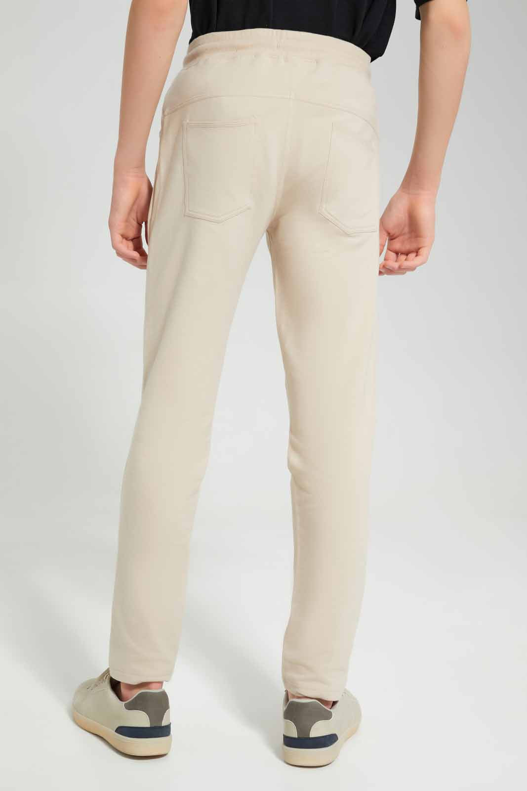 Redtag-Beige-Stretch-Active-Pants-BSR-Joggers,-Category:Joggers,-Colour:Beige,-Deals:New-In,-Filter:Senior-Boys-(8-to-14-Yrs),-New-In-BSR-APL,-Non-Sale,-Section:Boys-(0-to-14Yrs),-W22O-Senior-Boys-9 to 14 Years