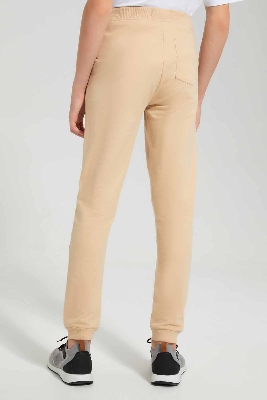 Redtag-Beige-Table-Active-Pant-BSR-Joggers,-Category:Joggers,-Colour:Beige,-Deals:New-In,-Filter:Senior-Boys-(9-to-14-Yrs),-New-In-BSR-APL,-Non-Sale,-Section:Boys-(0-to-14Yrs),-TBL,-W22O-Senior-Boys-9 to 14 Years