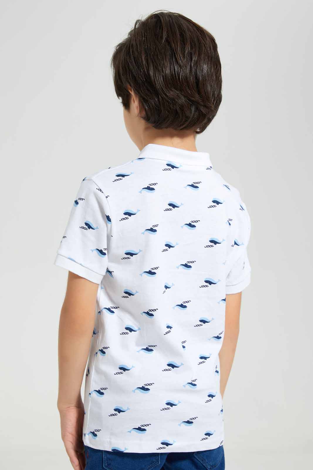 Redtag-White-Dolphin-AOP-SS-SS-Polo-BOY-Polo-T-Shirts,-Category:Polo-T-Shirts,-Colour:White,-Deals:New-In,-Filter:Boys-(2-to-8-Yrs),-New-In-BOY-APL,-Non-Sale,-Section:Boys-(0-to-14Yrs),-W22O-Boys-2 to 8 Years