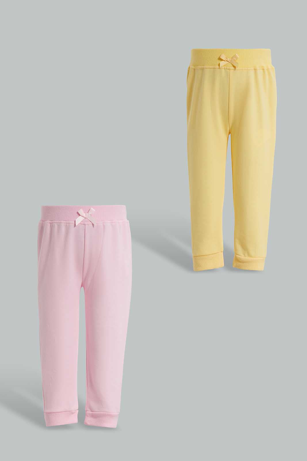 Redtag-Yellow-&-Pink-Solid-Colour-2Pcs-Pack-Track-Pants-Category:Joggers,-Colour:Assorted,-Deals:New-In,-Filter:Infant-Girls-(3-to-24-Mths),-ING-Joggers,-New-In-ING-APL,-Non-Sale,-Section:Girls-(0-to-14Yrs),-W22O-Infant-Girls-3 to 24 Months