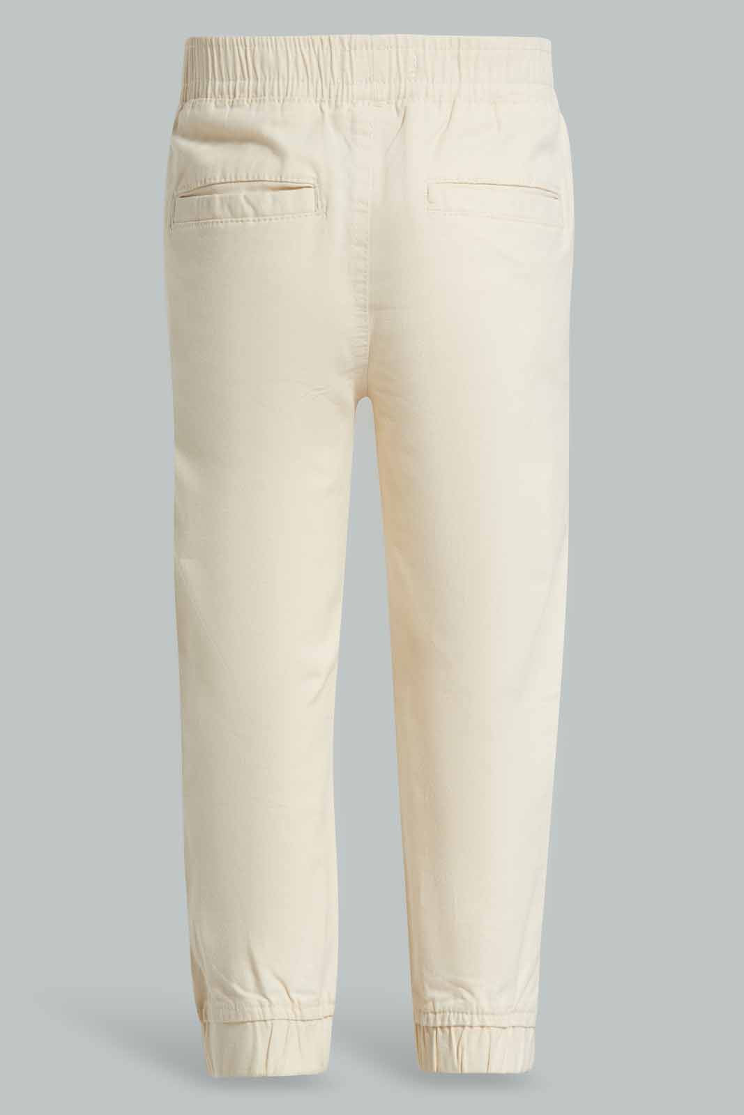 Redtag-Cream-Chino-Jogger-Category:Trousers,-Colour:Cream,-Deals:New-In,-Filter:Infant-Boys-(3-to-24-Mths),-INB-Trousers,-New-In-INB-APL,-Non-Sale,-Section:Boys-(0-to-14Yrs),-W22A-Infant-Boys-3 to 24 Months