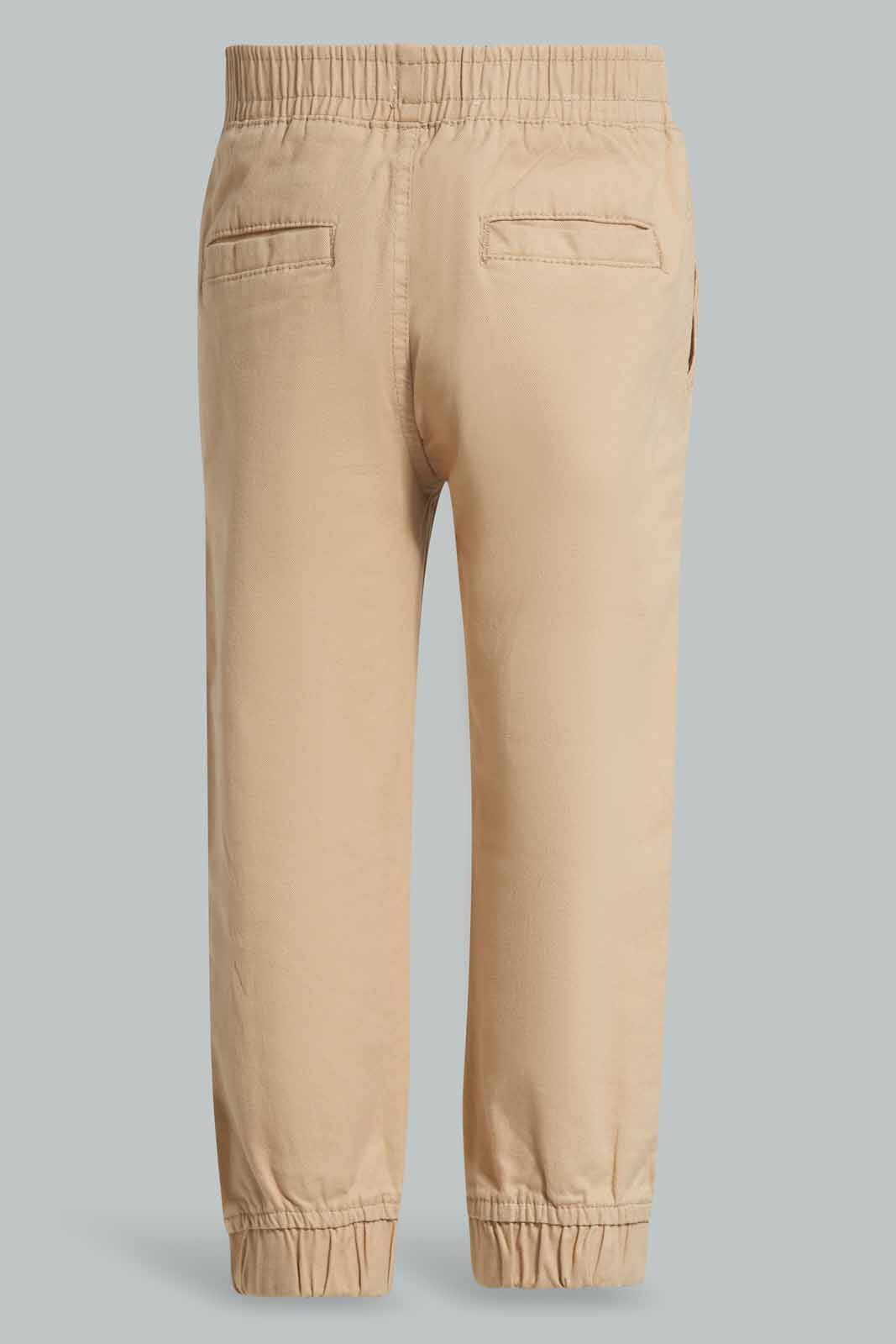 Redtag-Brown-Chino-Jogger-Category:Trousers,-Colour:Brown,-Deals:New-In,-Filter:Infant-Boys-(3-to-24-Mths),-INB-Trousers,-New-In-INB-APL,-Non-Sale,-Section:Boys-(0-to-14Yrs),-W22A-Infant-Boys-3 to 24 Months