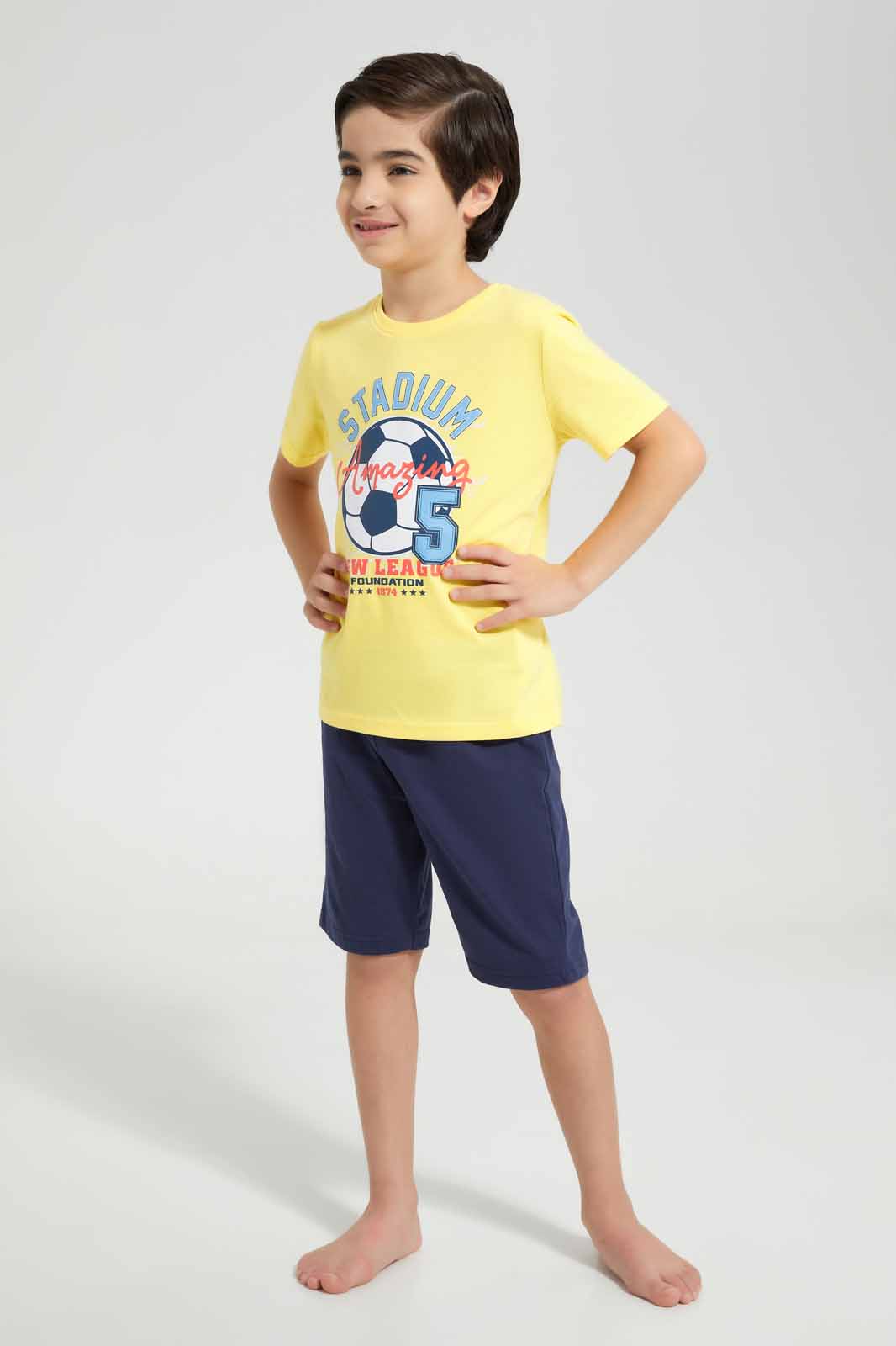 Redtag-Yellow-Football-Print-T-Shirt-And-Short-Pyjama-BOY-Pyjama-Sets,-Category:Pyjama-Sets,-Colour:Yellow,-Deals:New-In,-Filter:Boys-(2-to-8-Yrs),-New-In-BOY-APL,-Non-Sale,-Section:Boys-(0-to-14Yrs),-VLM,-W22O-Boys-2 to 8 Years