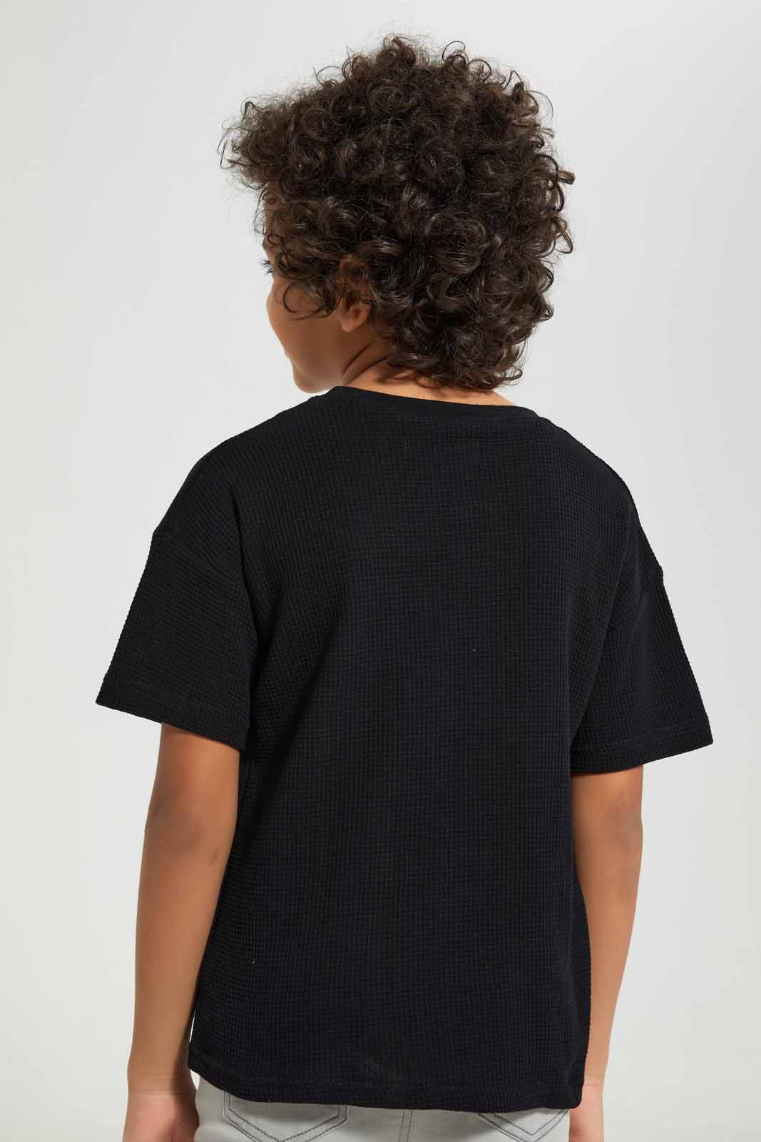 Redtag-Black-Short-Sleeve-Waffle-Oversize-T-Shirt-BOY-T-Shirts,-Category:T-Shirts,-Colour:Black,-Deals:New-In,-Filter:Boys-(2-to-8-Yrs),-New-In-BOY-APL,-Non-Sale,-Section:Boys-(0-to-14Yrs),-TBL,-W22A-Boys-2 to 8 Years