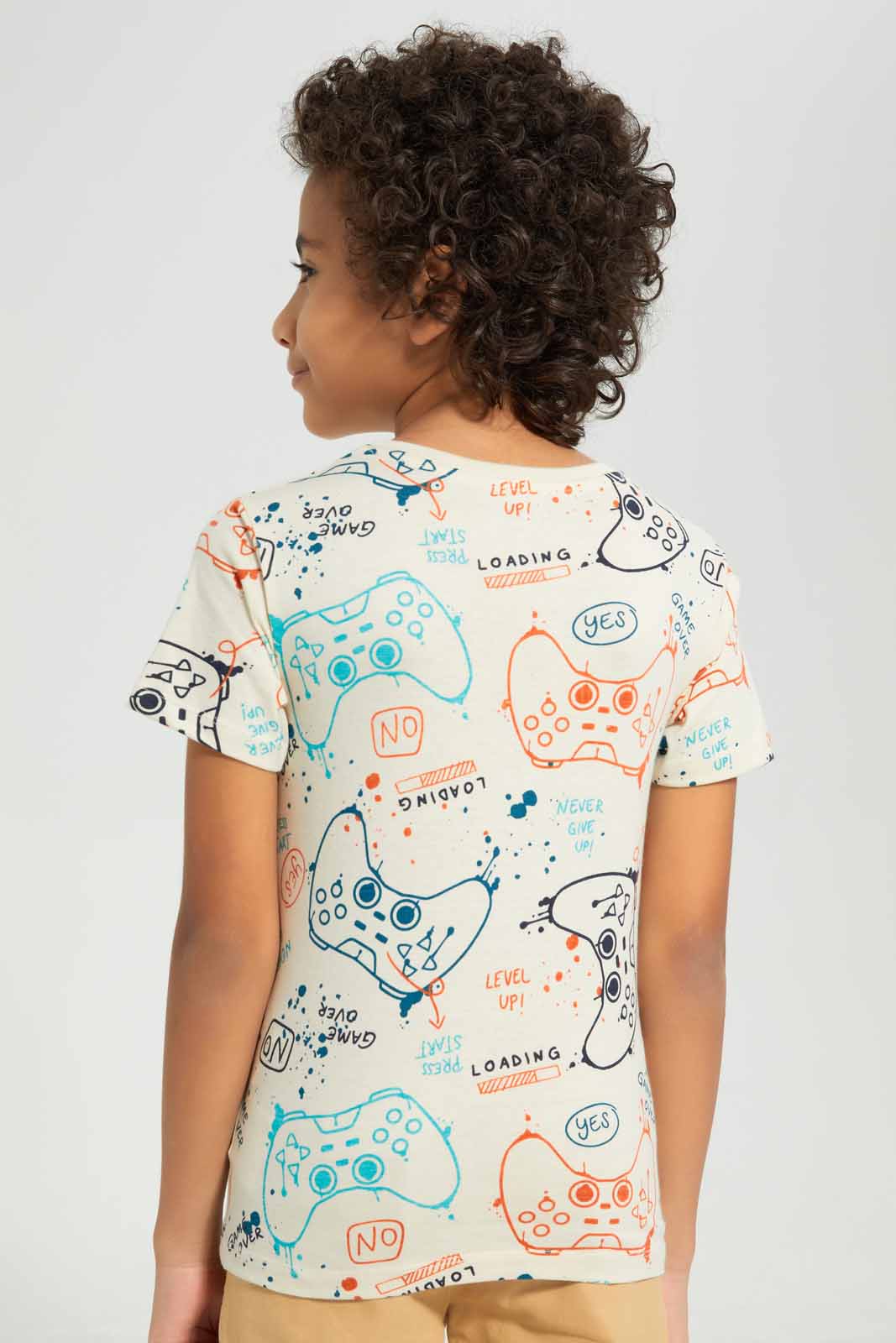 Redtag-Beige-Game-All-Over-Print-T-shirt-BOY-T-Shirts,-Category:T-Shirts,-Colour:Beige,-Deals:New-In,-Filter:Boys-(2-to-8-Yrs),-New-In-BOY-APL,-Non-Sale,-Section:Boys-(0-to-14Yrs),-TBL,-W22A-Boys-2 to 8 Years