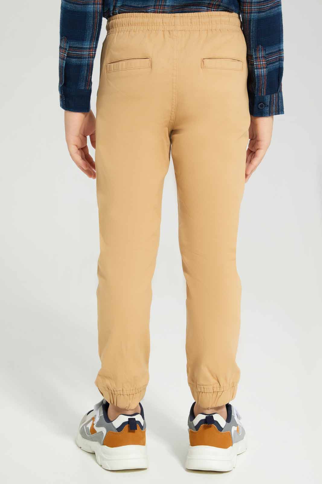 Redtag-Beige-Twill-Stretch-Jogger-BOY-Trousers,-Category:Trousers,-Colour:Beige,-Deals:New-In,-Filter:Boys-(2-to-8-Yrs),-New-In-BOY-APL,-Non-Sale,-Section:Boys-(0-to-14Yrs),-TBL,-W22B-Boys-2 to 8 Years