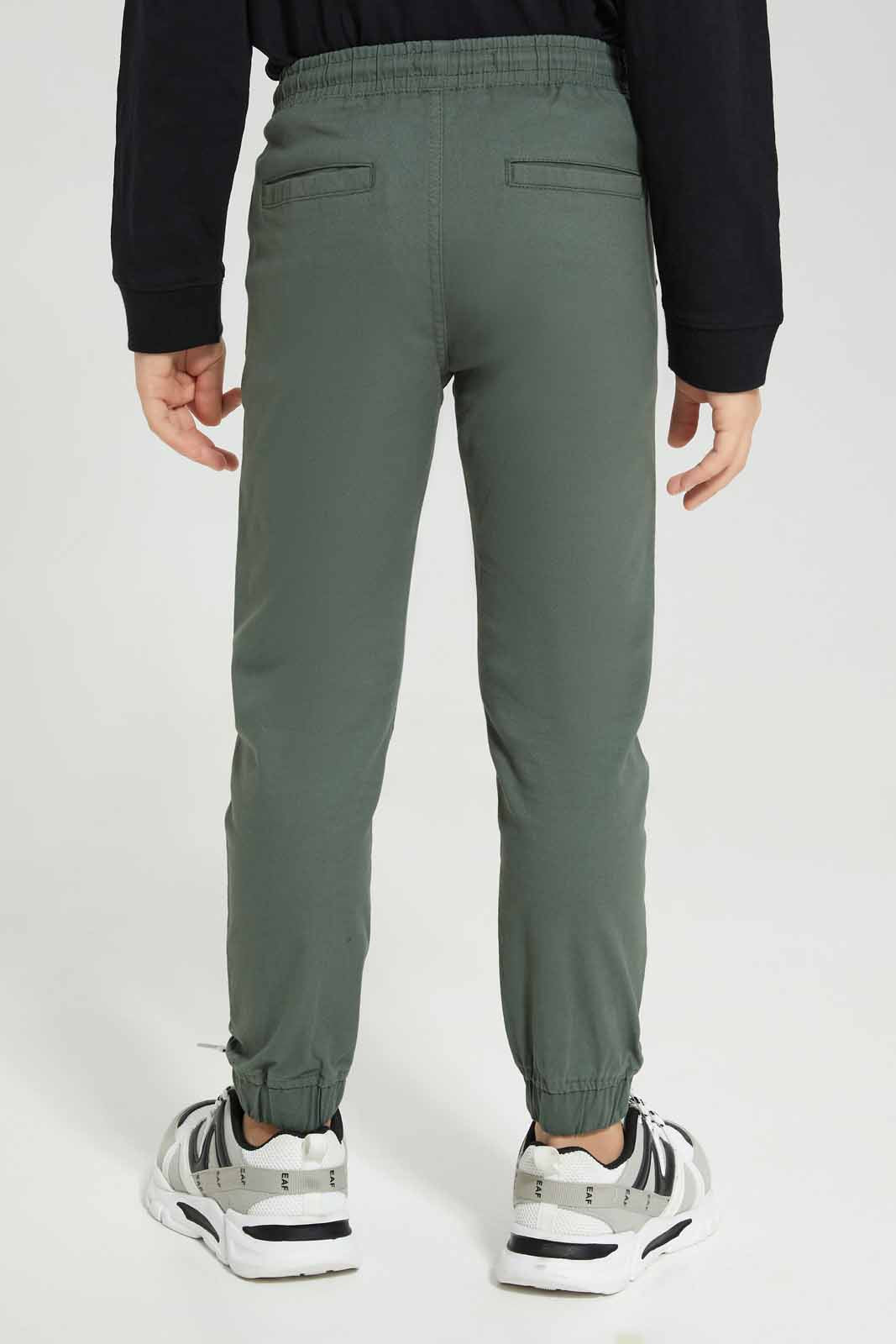Redtag-Dark-Green-Twill-Stretch-Jogger-BOY-Trousers,-Category:Trousers,-Colour:Olive,-Deals:New-In,-Filter:Boys-(2-to-8-Yrs),-New-In-BOY-APL,-Non-Sale,-Section:Boys-(0-to-14Yrs),-TBL,-W22B-Boys-2 to 8 Years