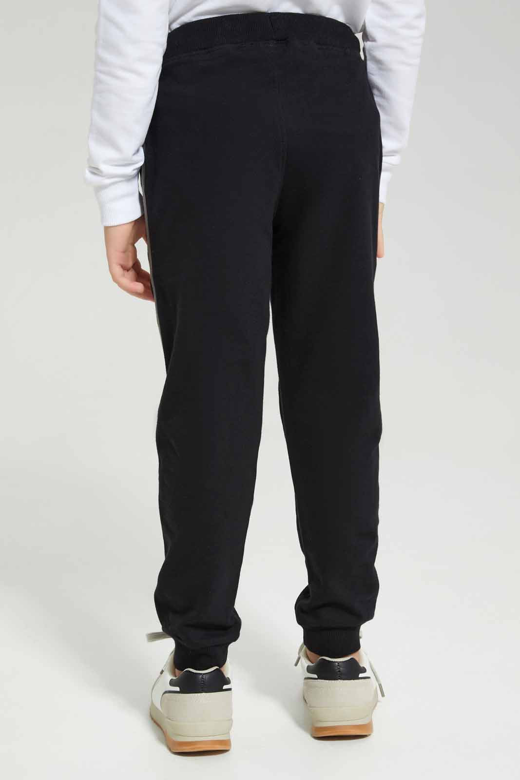 Redtag-Black-Tom-&-Jerry-Jog-Pant-BOY-Joggers,-Category:Joggers,-CHR,-Colour:Black,-Deals:New-In,-Filter:Boys-(2-to-8-Yrs),-New-In-BOY-APL,-Non-Sale,-Section:Boys-(0-to-14Yrs),-TBL,-W22B-Boys-2 to 8 Years