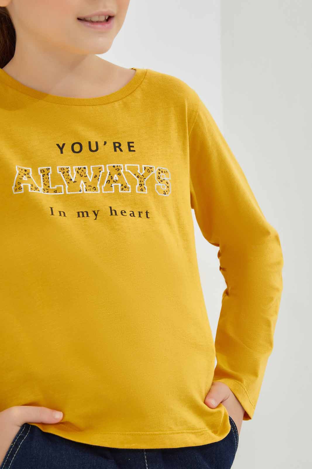 Redtag-Mustard-Ls-Basic-Tee-Slogan---Mustard-Category:T-Shirts,-Colour:Mustard,-Deals:New-In,-Dept:Girls,-Filter:Girls-(2-to-8-Yrs),-GIR-T-Shirts,-New-In-GIR-APL,-Non-Sale,-Section:Girls-(0-to-14Yrs),-TBL,-W22B-Girls-2 to 8 Years