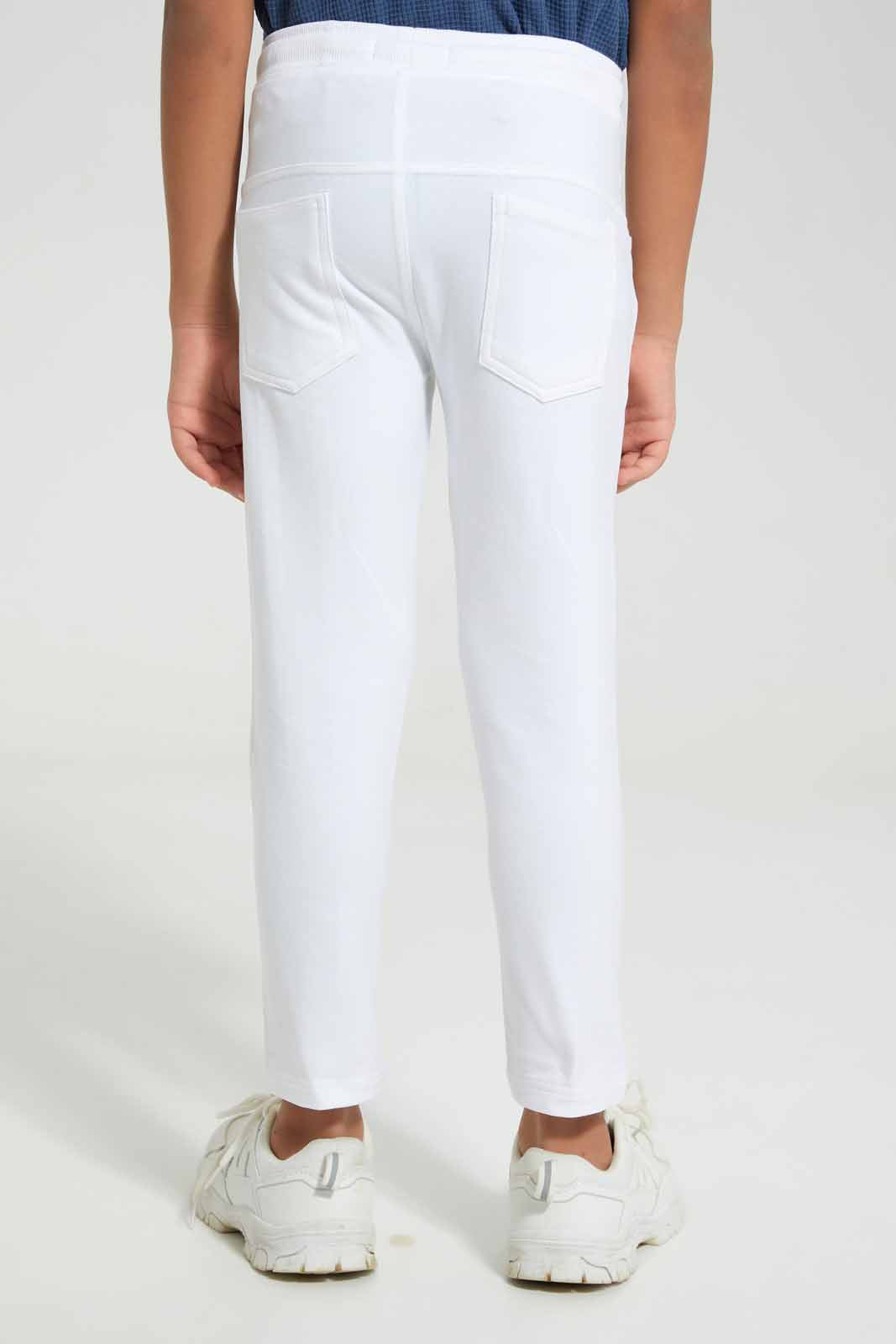 Redtag-White-Stretch-terry-Pant-BOY-Joggers,-Category:Joggers,-Colour:White,-Deals:New-In,-Filter:Boys-(2-to-8-Yrs),-New-In-BOY-APL,-Non-Sale,-Section:Boys-(0-to-14Yrs),-TBL,-W22A-Boys-2 to 8 Years