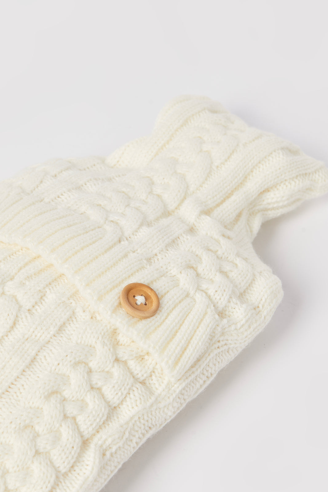 Redtag-2L-Hot-Water-Bag-With-Knitted-Cover-Category:Bags,-Colour:Beige,-Deals:2-FOR-49,-Dept:Home,-Filter:Travel-Accessories,-IMP-Bags,-New-In,-New-In-IMP-ACC,-Non-Sale,-S23A,-Section:Homewares-Home-Accessories-