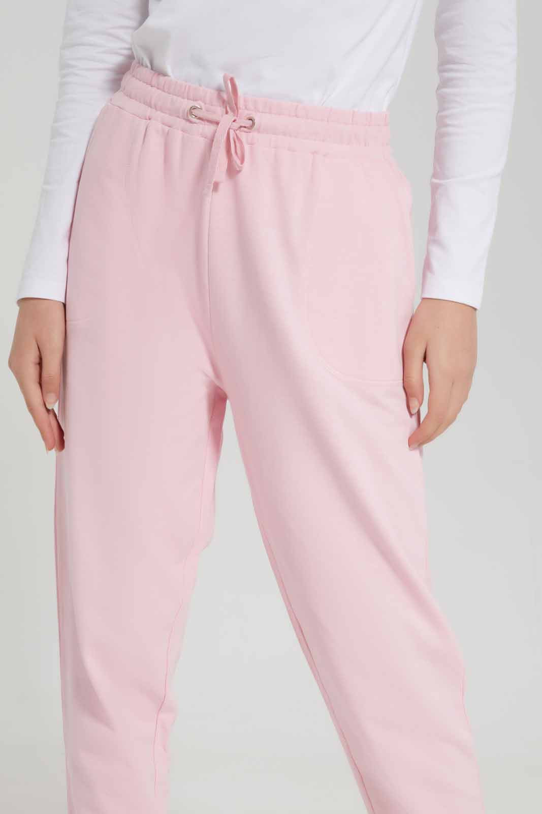 Redtag-Girls-Pale-Pink-Basic-Track-Pants-Category:Joggers,-Colour:Apricot,-Deals:New-In,-Dept:Girls,-Filter:Senior-Girls-(8-to-14-Yrs),-GSR-Joggers,-New-In-GSR-APL,-Non-Sale,-S23A,-Section:Girls-(0-to-14Yrs),-TBL-Senior-Girls-9 to 14 Years
