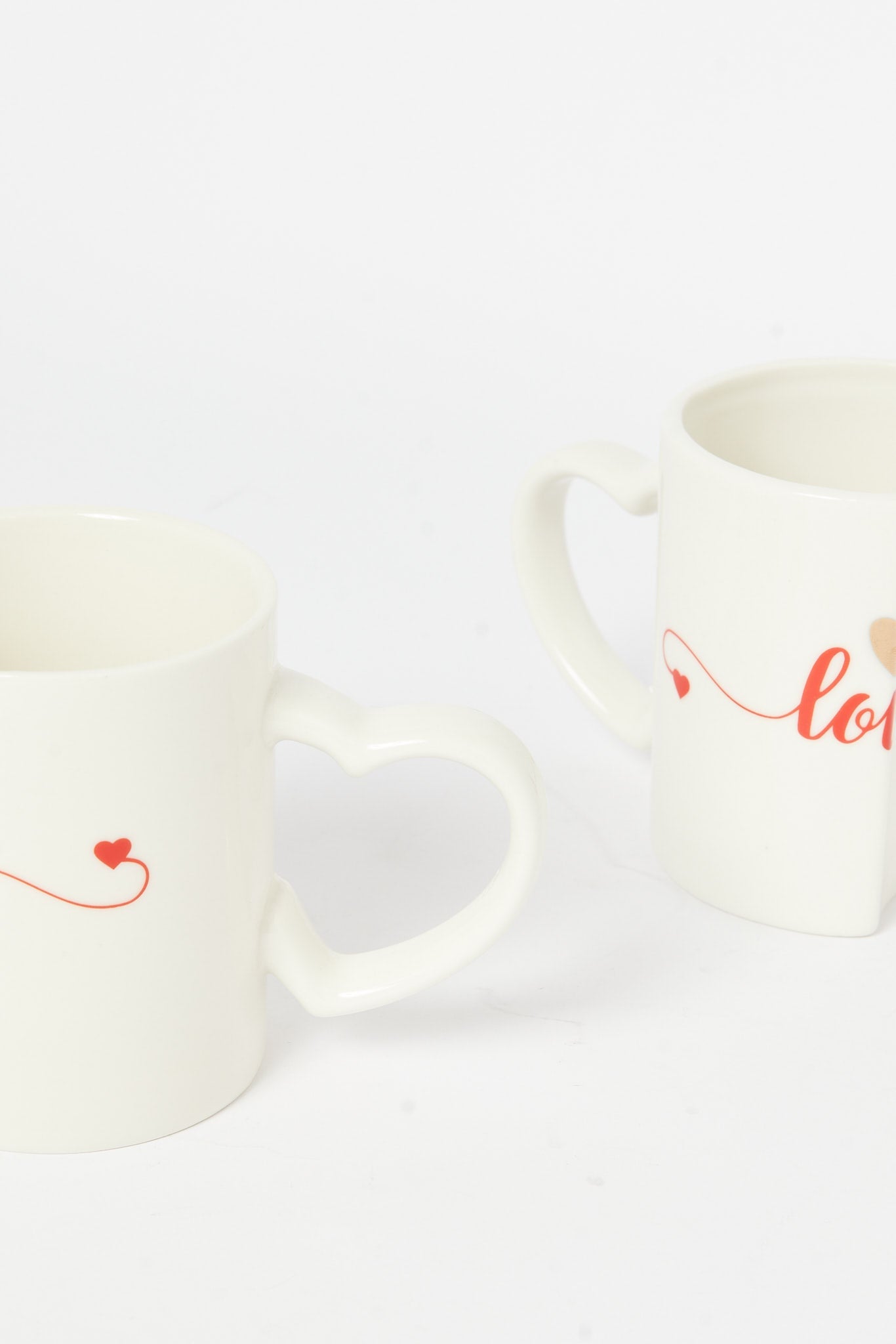 Redtag-White-Heart-Shape-Mug-(2-Piece)-Category:Cups-&-Mugs,-Colour:White,-Deals:New-In,-Dept:Home,-Filter:Home-Dining,-H1:HMW,-H2:DIN,-H3:CRC,-H4:CCS,-HMW-DIN-Crockery,-New-In-HMW-DIN,-Non-Sale,-S23A,-Season:S23A,-Section:Homewares-Home-Dining-