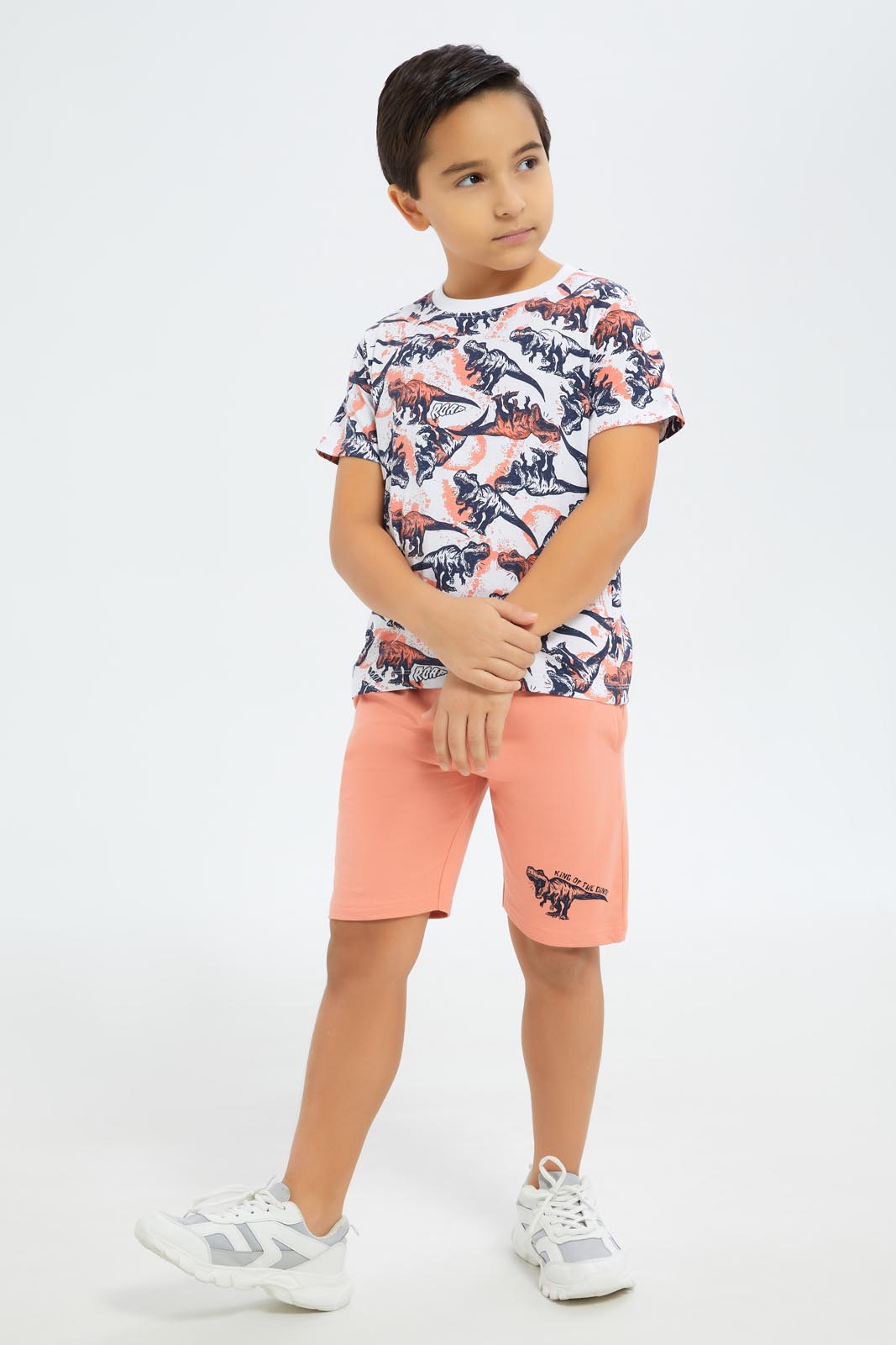 Redtag-Boys-Coral-Dino-Print-T-Shirt-And-Shorts-Set-BOY-Sets,-Category:Sets,-Colour:Red,-Deals:New-In,-Dept:Boys,-Filter:Boys-(2-to-8-Yrs),-New-In-BOY-APL,-Non-Sale,-S23B,-Section:Boys-(0-to-14Yrs)-Boys-2 to 8 Years