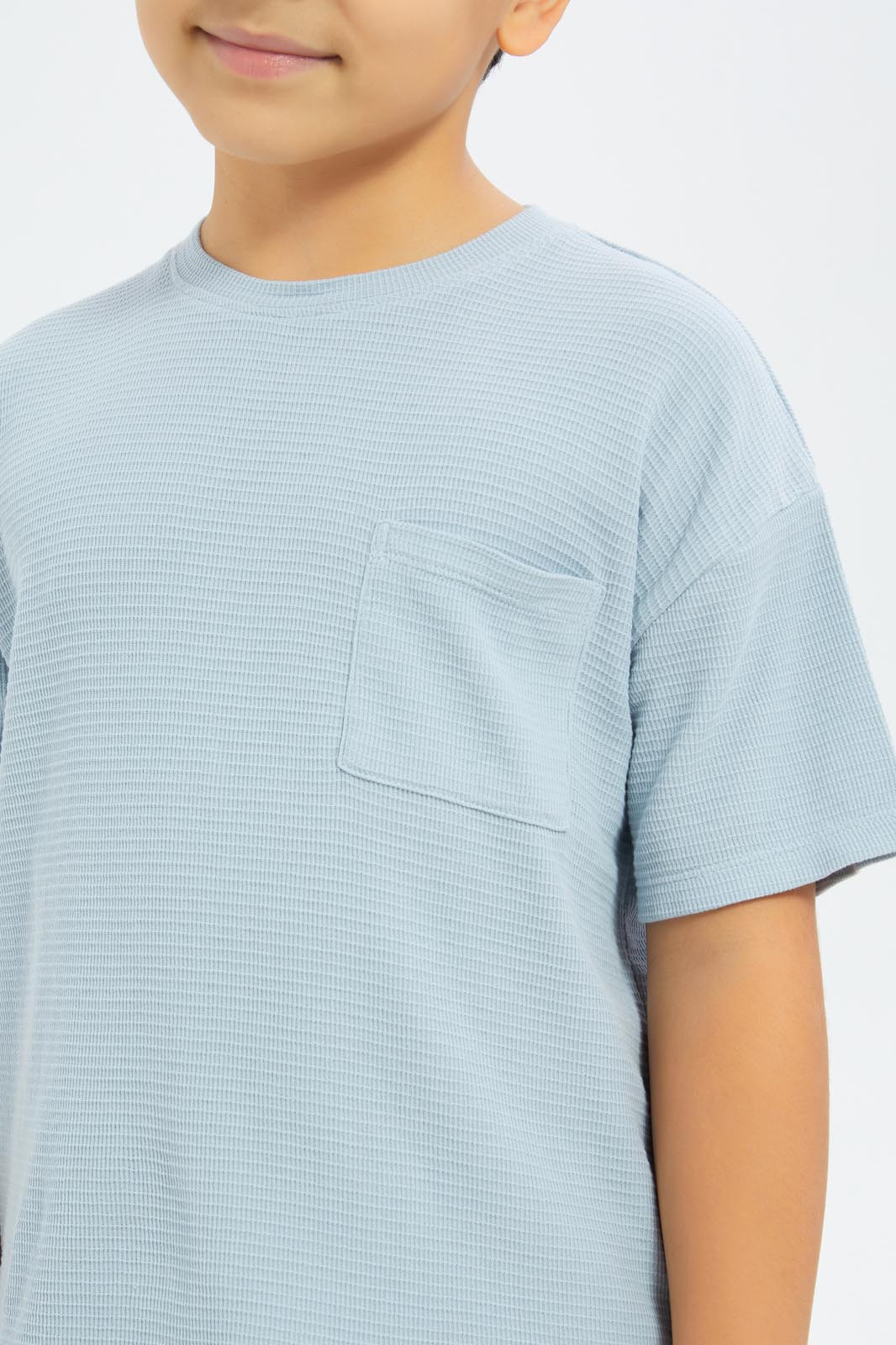 Redtag-Boys-Blue-Over-Size-Waffle-T-Shirt-BOY-T-Shirts,-Category:T-Shirts,-CHA,-Colour:Blue,-Deals:New-In,-Dept:Boys,-Filter:Boys-(2-to-8-Yrs),-New-In-BOY-APL,-Non-Sale,-S23C,-Section:Boys-(0-to-14Yrs)-Boys-2 to 8 Years
