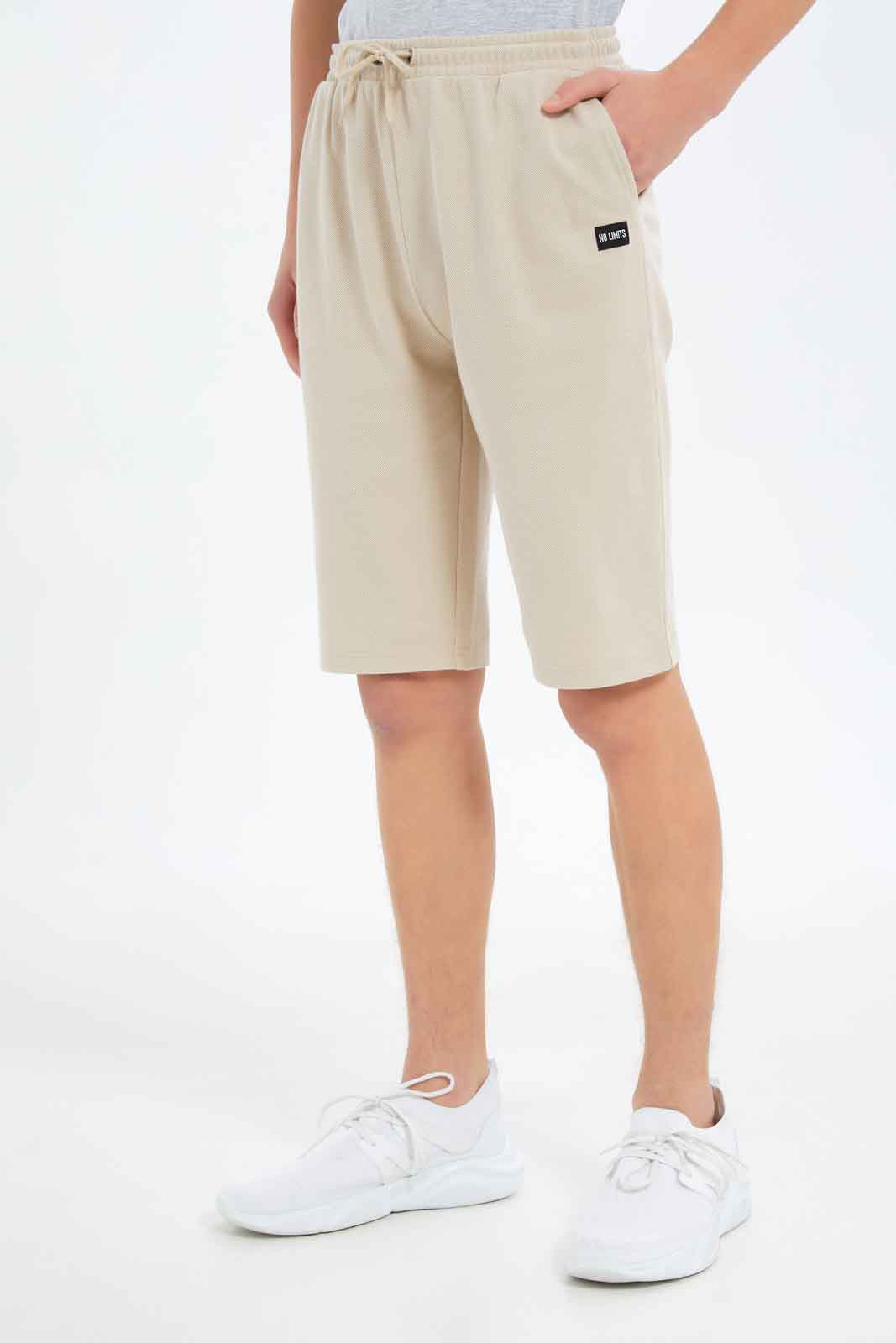 Redtag-Boys-Beige-Pique-Active-Shorts-BSR-Shorts,-Category:Shorts,-Colour:Beige,-Deals:New-In,-Dept:Boys,-Filter:Senior-Boys-(8-to-14-Yrs),-New-In-BSR-APL,-Non-Sale,-S23C,-Section:Boys-(0-to-14Yrs)-Senior-Boys-9 to 14 Years