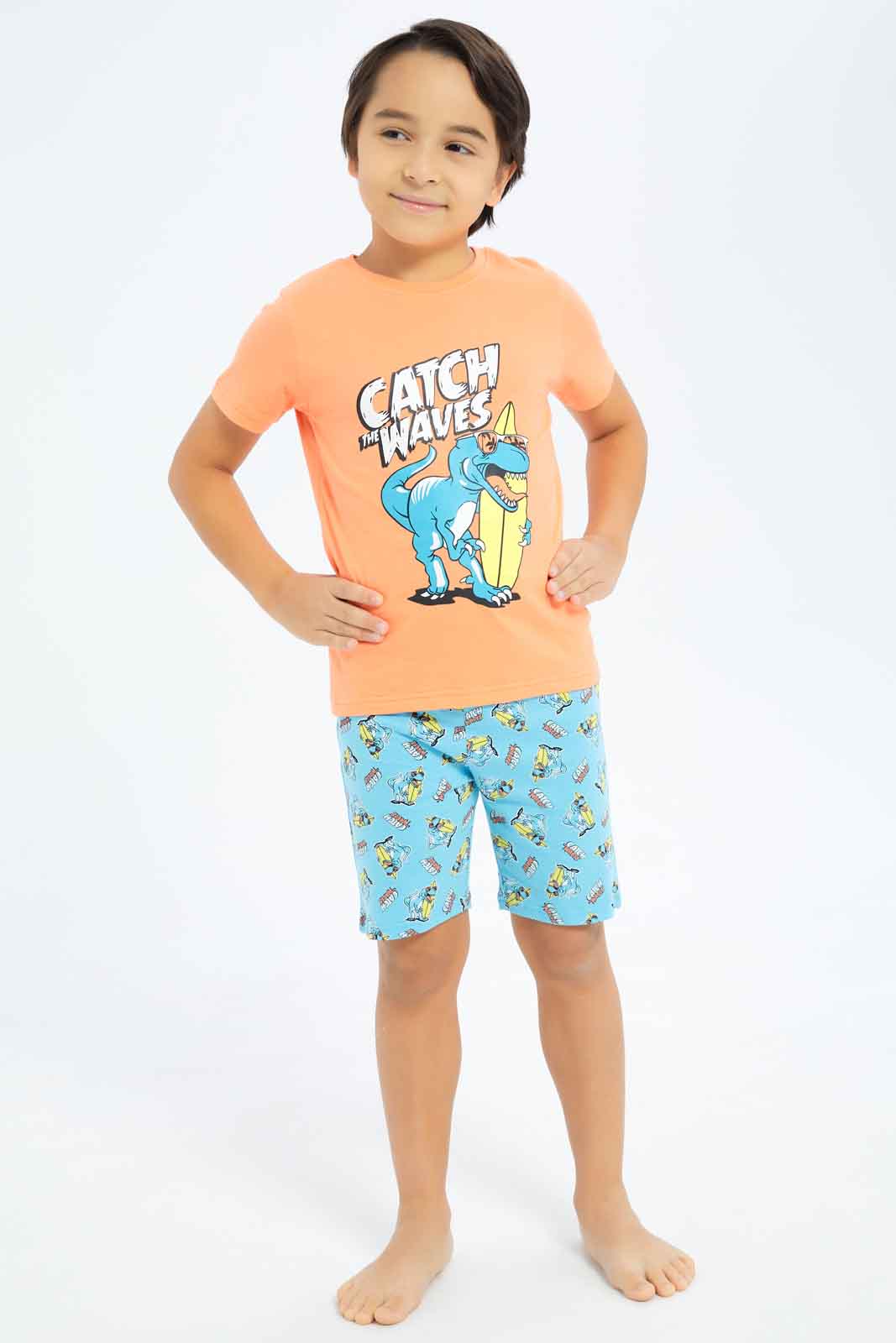 Redtag-Boys-Coral-Dino-Short-Sleeve-Tee-And-Shorts-Pyjama-Set-BOY-Pyjama-Sets,-Category:Pyjama-Sets,-Colour:Red,-Deals:New-In,-Dept:Boys,-Filter:Boys-(2-to-8-Yrs),-New-In-BOY-APL,-Non-Sale,-S23C,-Section:Boys-(0-to-14Yrs),-VLM-Boys-2 to 8 Years