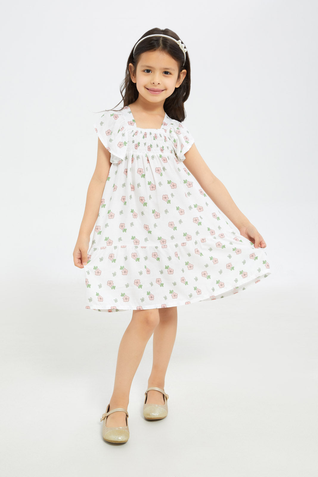 Redtag-Girls-Sleeveless-Shirred-Ruffle-Dress-Cream-Pink-Floral-Category:Dresses,-Colour:Cream,-Deals:New-In,-Filter:Girls-(2-to-8-Yrs),-GIR-Dresses,-H1:KWR,-H2:GIR,-H3:DRS,-H4:CAD,-New-In-GIR-APL,-Non-Sale,-S23C,-Season:S23C,-Section:Girls-(0-to-14Yrs)-Girls-2 to 8 Years