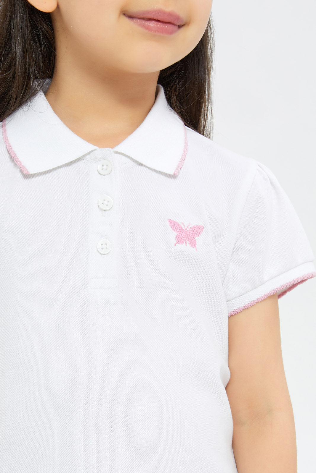 Redtag-Girls-White-Solid-With-Embroidered-Polo-Shirt-Category:T-Shirts,-Colour:White,-Deals:New-In,-Filter:Girls-(2-to-8-Yrs),-GIR-T-Shirts,-H1:KWR,-H2:GIR,-H3:TSH,-H4:CAT,-New-In-GIR-APL,-Non-Sale,-Promo:TBL,-S23C,-Season:S23C,-Section:Girls-(0-to-14Yrs),-TBL-Girls-2 to 8 Years