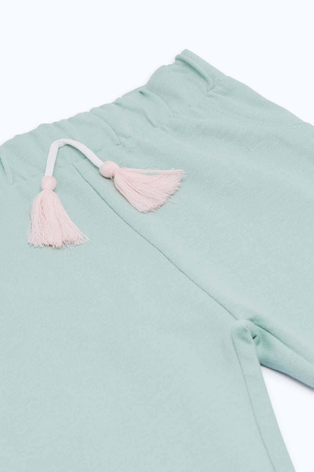 Redtag-Girls-Sage-Solid-Active-Track-Pant-Category:Joggers,-Colour:Green,-Deals:New-In,-Filter:Infant-Girls-(3-to-24-Mths),-H1:KWR,-H2:ING,-H3:SPW,-H4:ATP,-ING-Joggers,-New-In-ING-APL,-Non-Sale,-S23C,-Season:S23C,-Section:Girls-(0-to-14Yrs)-Infant-Girls-3 to 24 Months