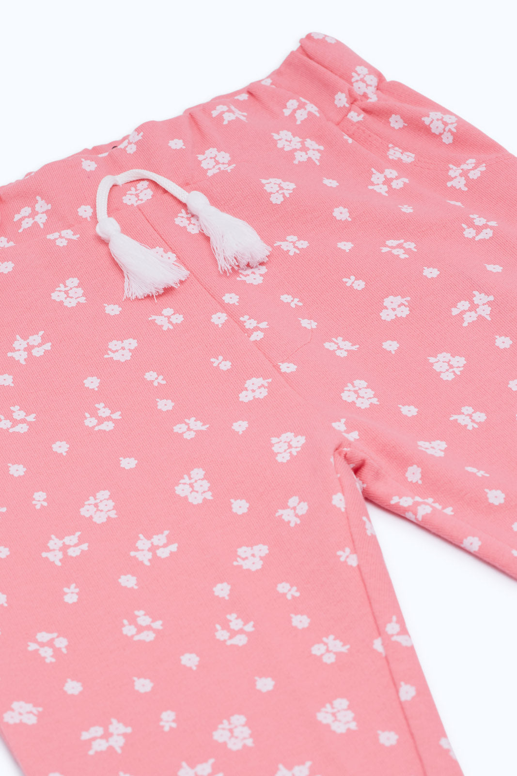 Redtag-Girls-Soft-Pink-Aop-Active-Track-Pant-Category:Joggers,-Colour:Apricot,-Deals:New-In,-Filter:Infant-Girls-(3-to-24-Mths),-H1:KWR,-H2:ING,-H3:SPW,-H4:ATP,-ING-Joggers,-New-In-ING-APL,-Non-Sale,-S23C,-Season:S23C,-Section:Girls-(0-to-14Yrs)-Infant-Girls-3 to 24 Months