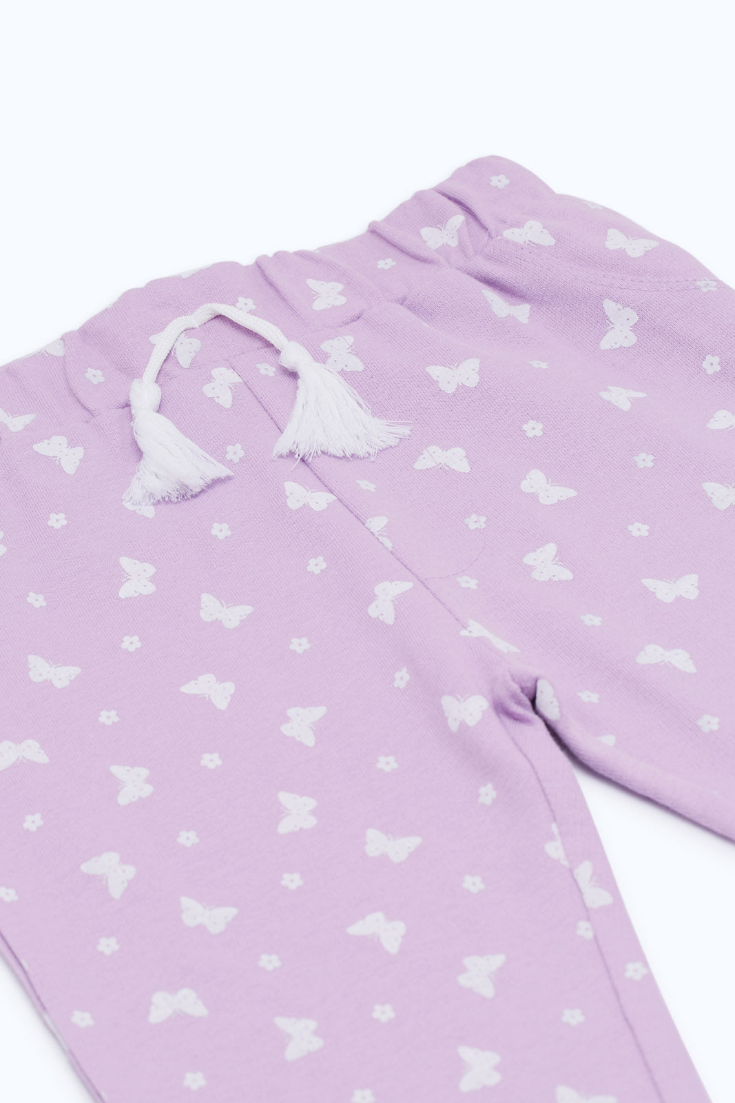 Redtag-Girls-Lilac-Aop-Active-Track-Pant-Category:Joggers,-Colour:Lilac,-Deals:New-In,-Filter:Infant-Girls-(3-to-24-Mths),-H1:KWR,-H2:ING,-H3:SPW,-H4:ATP,-ING-Joggers,-New-In-ING-APL,-Non-Sale,-S23C,-Season:S23C,-Section:Girls-(0-to-14Yrs)-Infant-Girls-3 to 24 Months