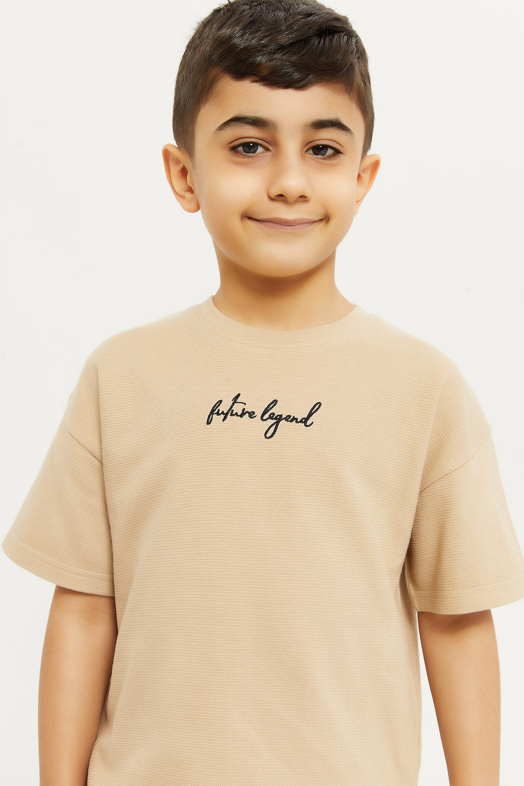 Redtag-Boys-Ecru-Jaquard-Oversized-T-Shirt-BOY-T-Shirts,-Category:T-Shirts,-Colour:Ecru,-Deals:New-In,-Filter:Boys-(2-to-8-Yrs),-H1:KWR,-H2:BOY,-H3:TSH,-H4:TSH,-KWRBOYTSHTSH,-New-In-BOY-APL,-Non-Sale,-Promo:TBL,-S23D,-Season:S23D,-Section:Boys-(0-to-14Yrs),-TBL-Boys-2 to 8 Years