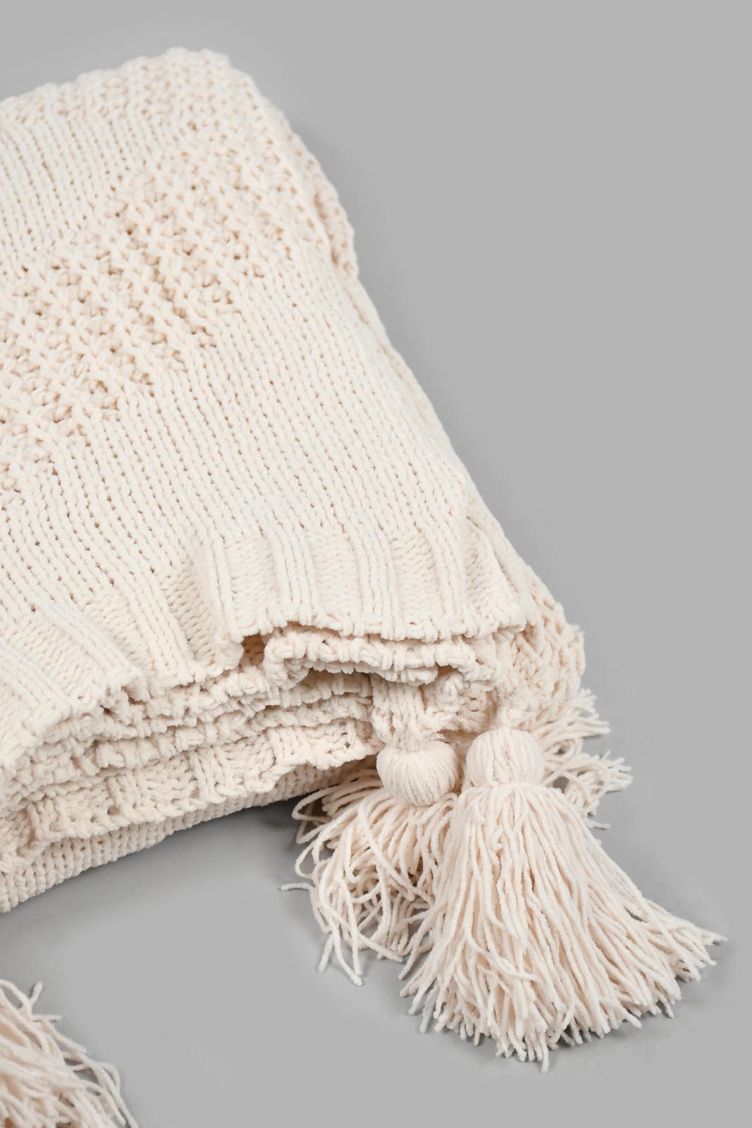 Redtag-Ivory-Knitted-Throw-With-Tassel-Throws-Home-Bedroom-