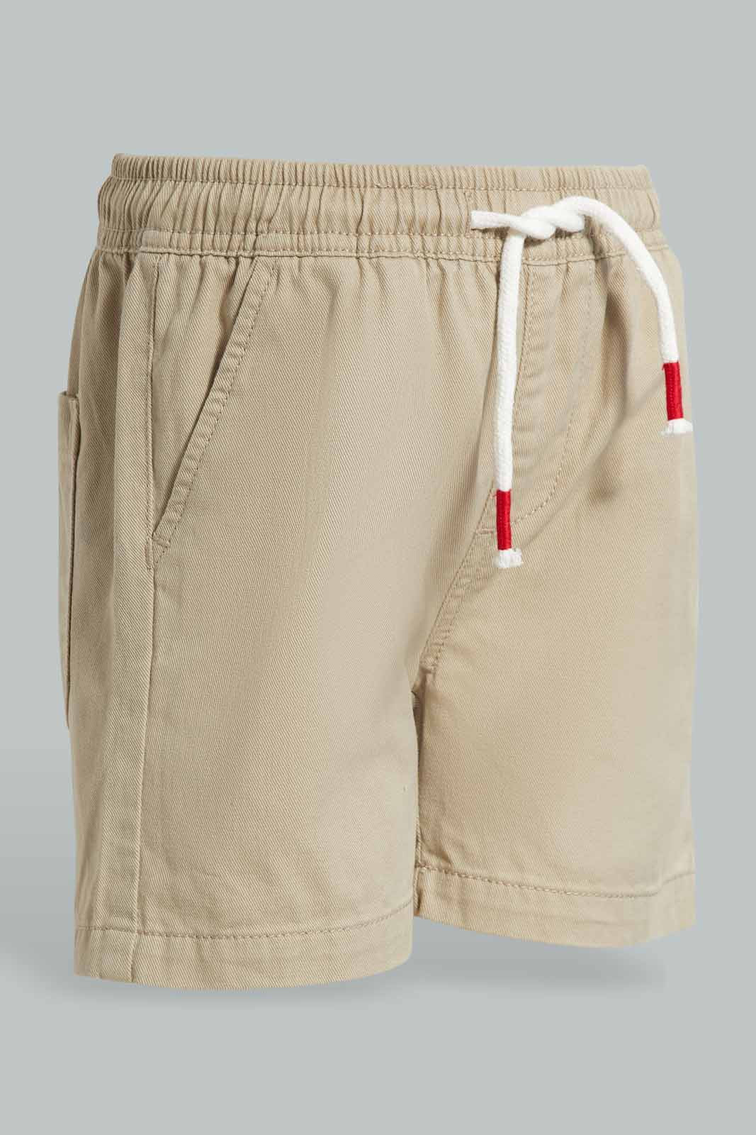 Redtag-Stone-Pull-On-Twill-Short-BOY-Shorts,-Category:Shorts,-Colour:Beige,-Deals:4-For-90,-Deals:New-In,-Filter:Boys-(2-to-8-Yrs),-New-In-BOY-APL,-S22C,-Section:Kidswear-Boys-2 to 8 Years