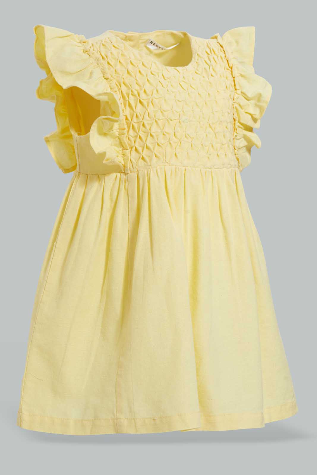 Redtag-Yellow-Smocking-Yoke-Flutter-Sleeves-Dress-Dresses-Infant-Girls-3 to 24 Months