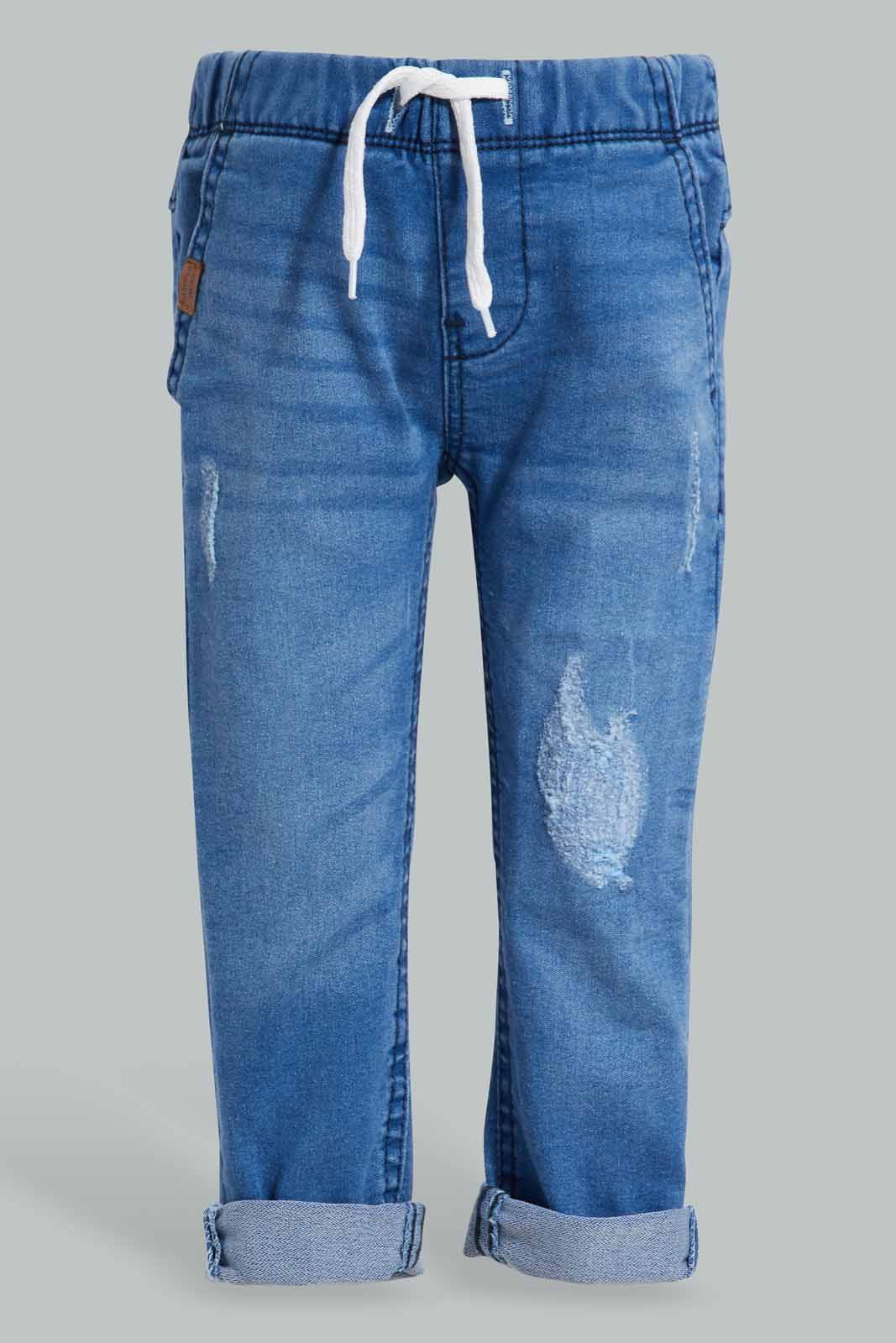 Redtag-Light-Wash-Pull-On-Denim-Pant-With-Pu-Patch-Category:Jeans,-Colour:Light-Wash,-Deals:New-In,-Filter:Infant-Boys-(3-to-24-Mths),-INB-Jeans,-New-In-INB-APL,-Non-Sale,-S22D,-Section:Boys-(0-to-14Yrs)-Infant-Boys-3 to 24 Months