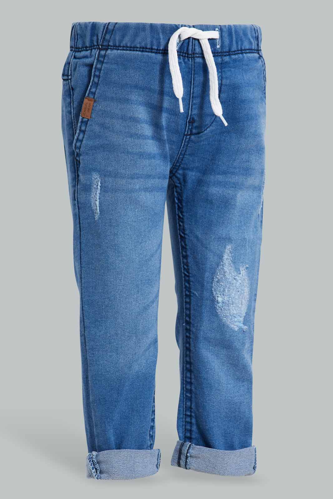 Redtag-Light-Wash-Pull-On-Denim-Pant-With-Pu-Patch-Category:Jeans,-Colour:Light-Wash,-Deals:New-In,-Filter:Infant-Boys-(3-to-24-Mths),-INB-Jeans,-New-In-INB-APL,-Non-Sale,-S22D,-Section:Boys-(0-to-14Yrs)-Infant-Boys-3 to 24 Months