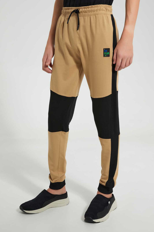 Redtag-Lt.-Beige-Biker-Knee-Jogger-Pant-Joggers-Senior-Boys-9 to 14 Years