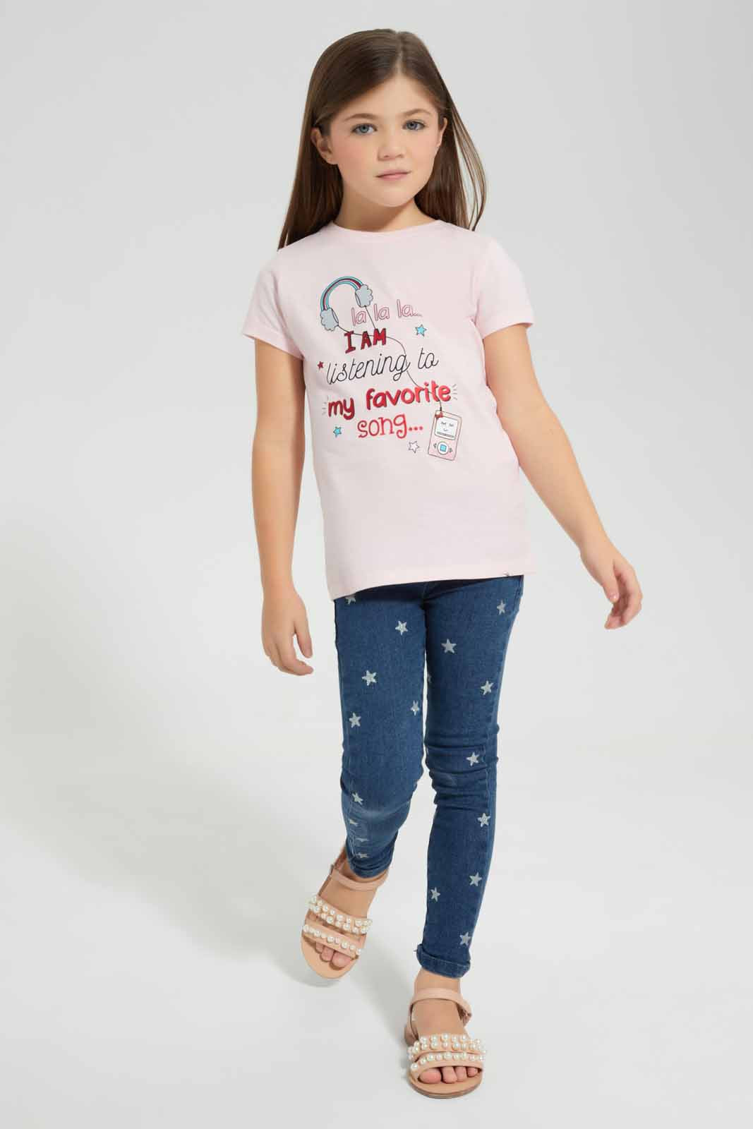 Redtag-Pink-T-Shirt-With-Placment-Print-Category:T-Shirts,-Colour:Apricot,-Deals:New-In,-Filter:Girls-(2-to-8-Yrs),-GIR-T-Shirts,-New-In-GIR-APL,-Non-Sale,-S22D,-Section:Girls-(0-to-14Yrs),-TBL-Girls-2 to 8 Years