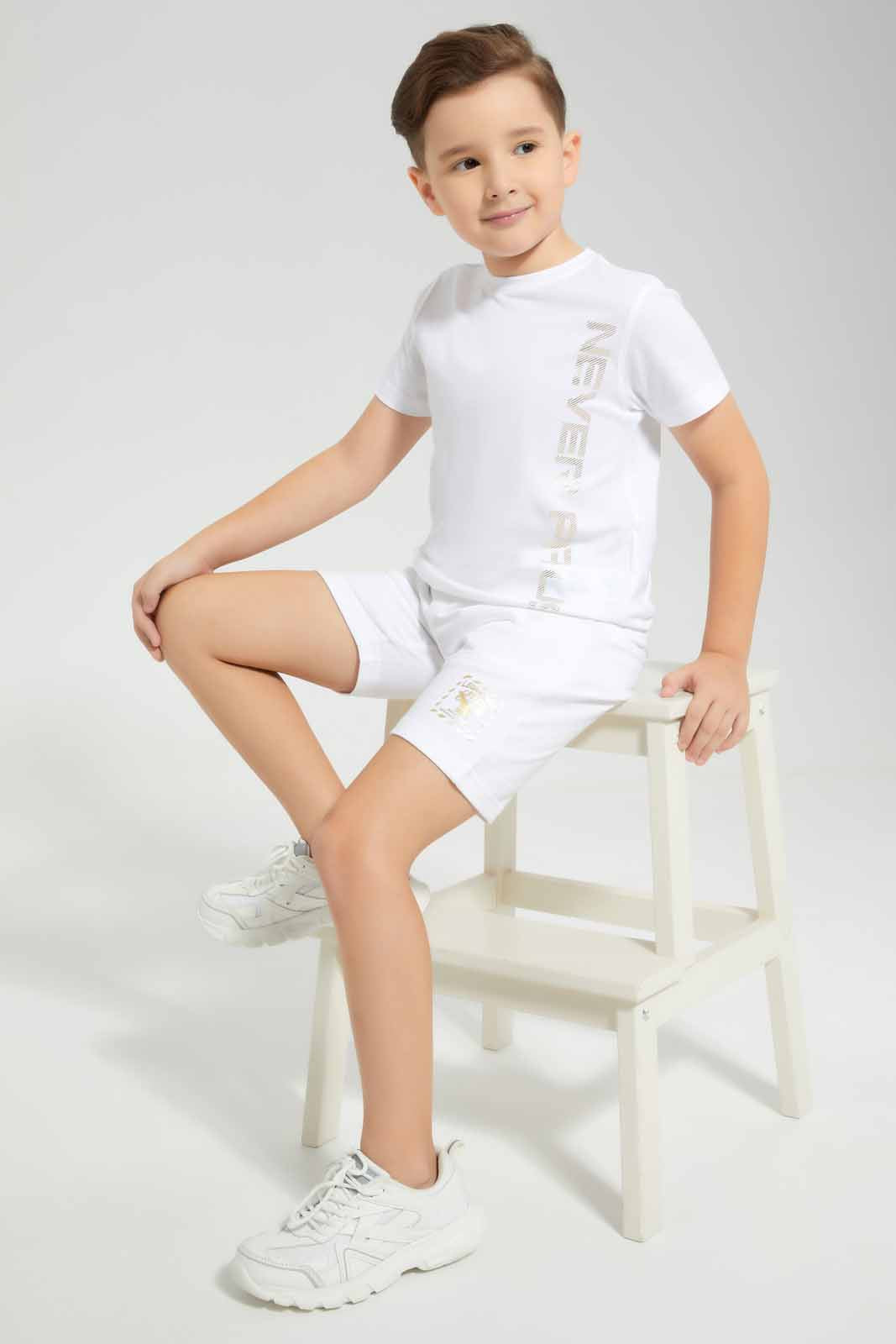 Redtag-White-Never-Pause-Print-T-Shirt-And-Short-Set-BOY-Sets,-Category:Sets,-Colour:White,-Deals:New-In,-EID,-Filter:Boys-(2-to-8-Yrs),-New-In-BOY-APL,-Non-Sale,-Section:Boys-(0-to-14Yrs),-W22O-Boys-2 to 8 Years