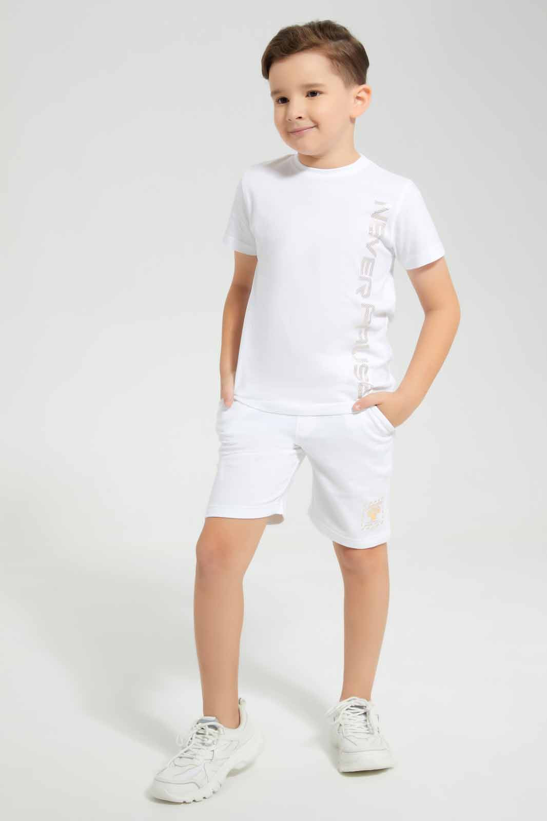 Redtag-White-Never-Pause-Print-T-Shirt-And-Short-Set-BOY-Sets,-Category:Sets,-Colour:White,-Deals:New-In,-EID,-Filter:Boys-(2-to-8-Yrs),-New-In-BOY-APL,-Non-Sale,-Section:Boys-(0-to-14Yrs),-W22O-Boys-2 to 8 Years