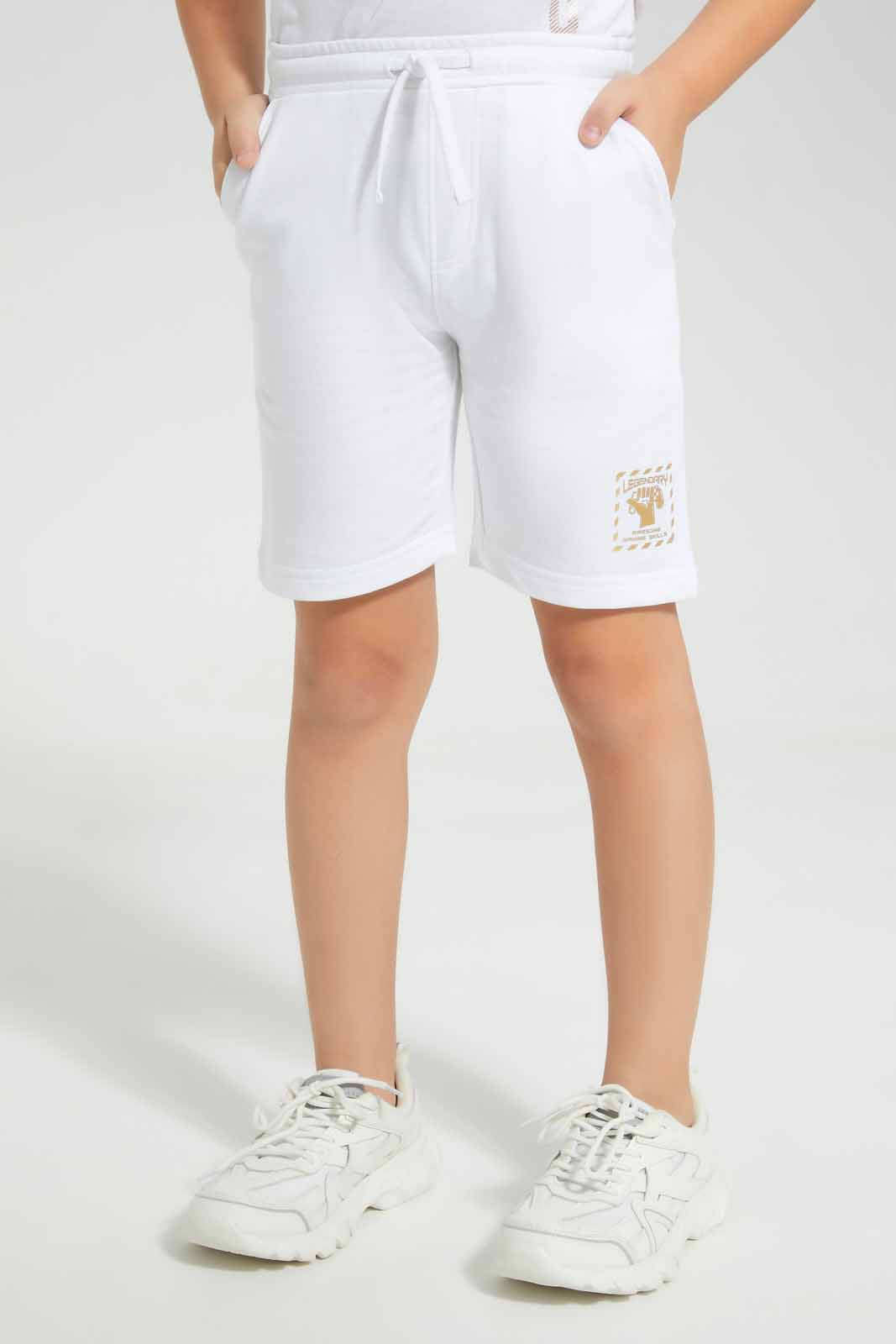 Redtag-White-Never-Pause-Print-T-Shirt-And-Short-Set-BOY-Sets,-Category:Sets,-Colour:White,-Deals:New-In,-EID,-Filter:Boys-(2-to-8-Yrs),-New-In-BOY-APL,-Non-Sale,-Section:Boys-(0-to-14Yrs),-W22O-Boys-2 to 8 Years