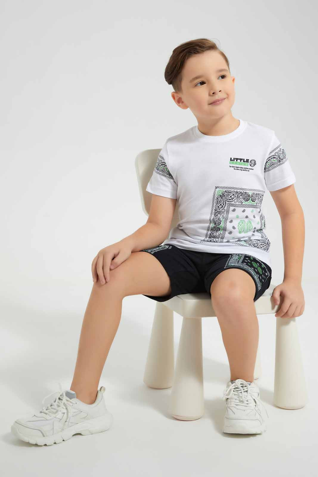 Redtag-White-Printed-T-Shirt-And-Short-Set-BOY-Sets,-Category:Sets,-Colour:White,-Deals:New-In,-EID,-Filter:Boys-(2-to-8-Yrs),-New-In-BOY-APL,-Non-Sale,-Section:Boys-(0-to-14Yrs),-W22O-Boys-2 to 8 Years