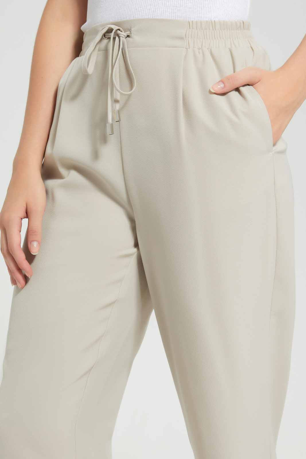 Redtag-Beige-Tapered-Leg-Elasticated-Wasit-Pant-Category:Trousers,-Colour:Beige,-Deals:New-In,-Filter:Women's-Clothing,-KSH,-New-In-Women-APL,-Non-Sale,-Section:Women,-W22O,-Women-Trousers-Women's-