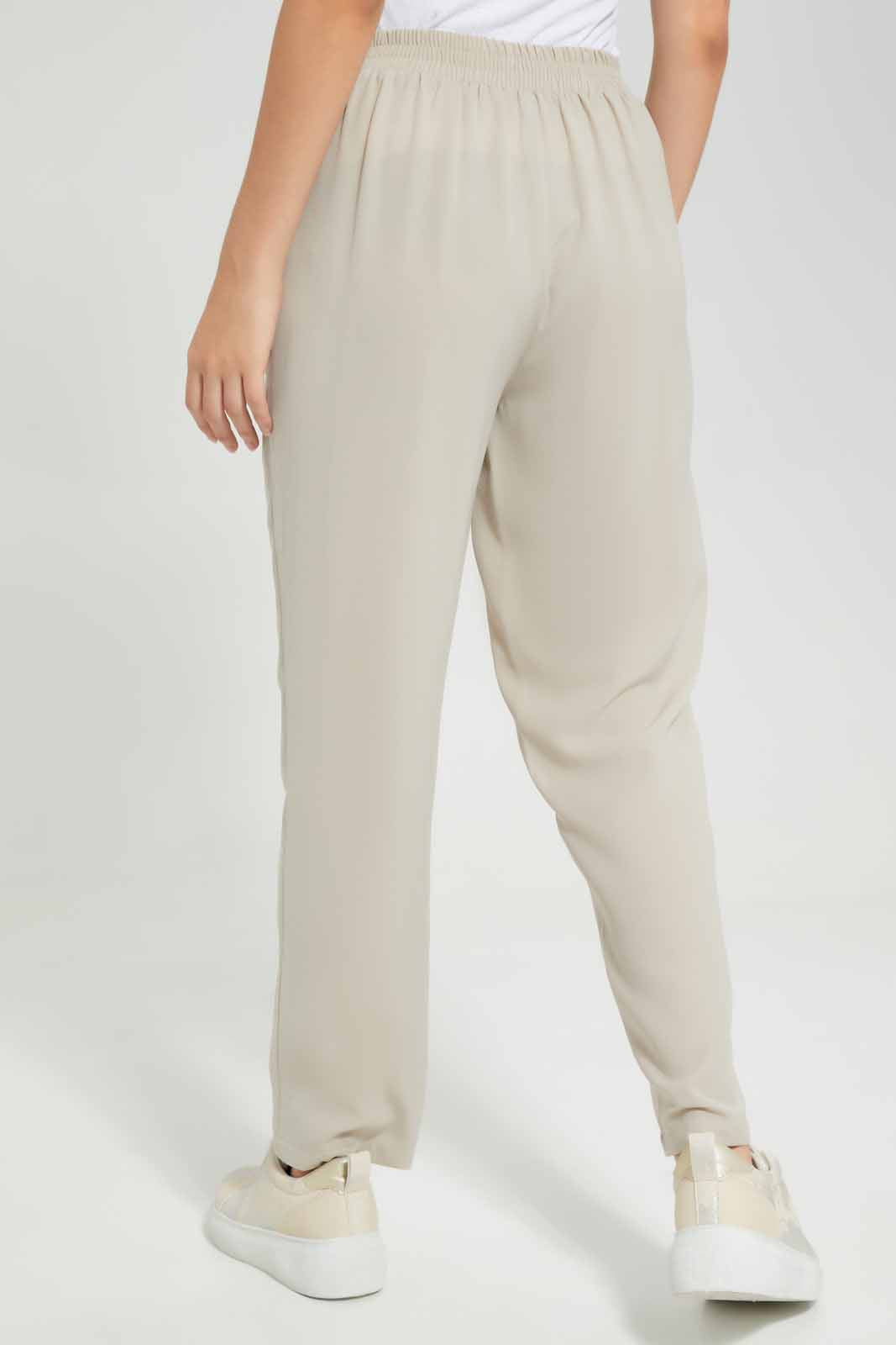 Redtag-Beige-Tapered-Leg-Elasticated-Wasit-Pant-Category:Trousers,-Colour:Beige,-Deals:New-In,-Filter:Women's-Clothing,-KSH,-New-In-Women-APL,-Non-Sale,-Section:Women,-W22O,-Women-Trousers-Women's-