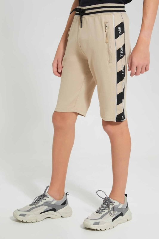 Redtag-Beige-Foil-Print-Active-Shorts-BSR-Shorts,-Category:Shorts,-Colour:Beige,-Deals:New-In,-Filter:Senior-Boys-(9-to-14-Yrs),-New-In-BSR-APL,-Non-Sale,-Section:Boys-(0-to-14Yrs),-W22O-Senior-Boys-9 to 14 Years