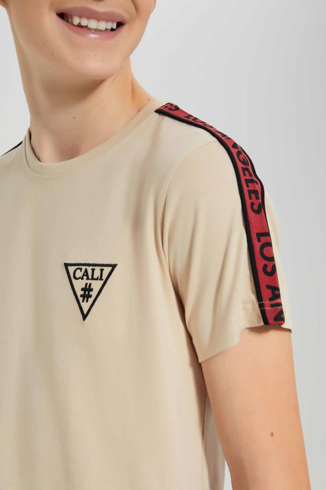 Redtag-Beige-Cali-LA-T-Shirt-BSR-T-Shirts,-Category:T-Shirts,-Colour:Beige,-Deals:New-In,-Festive,-Filter:Senior-Boys-(9-to-14-Yrs),-New-In-BSR-APL,-Non-Sale,-Section:Boys-(0-to-14Yrs),-W22O-Senior-Boys-9 to 14 Years